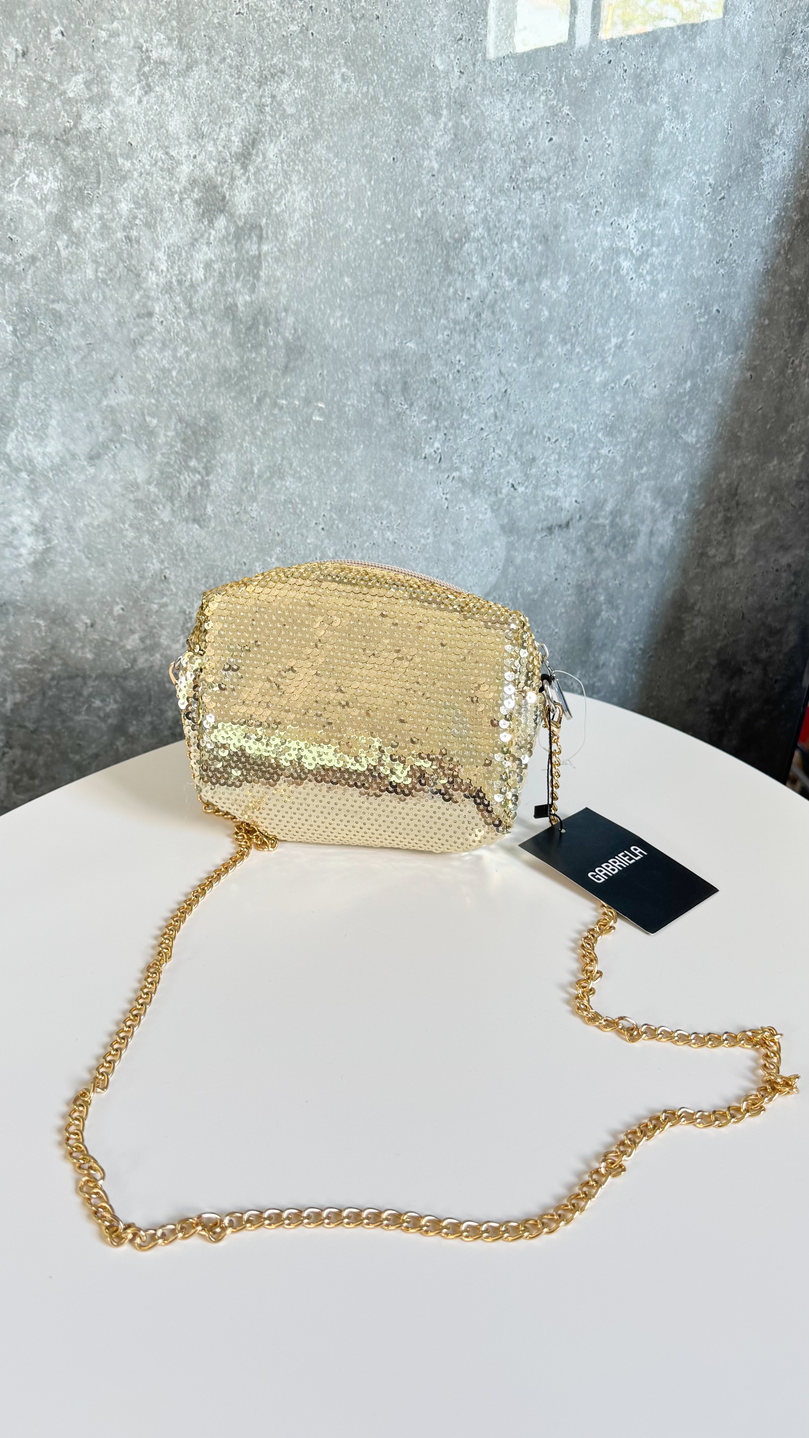 Carterita NUEVA dorada con lentejuelas