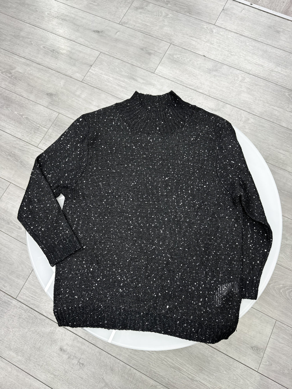 Buzo negro de lentejuelas talle XS