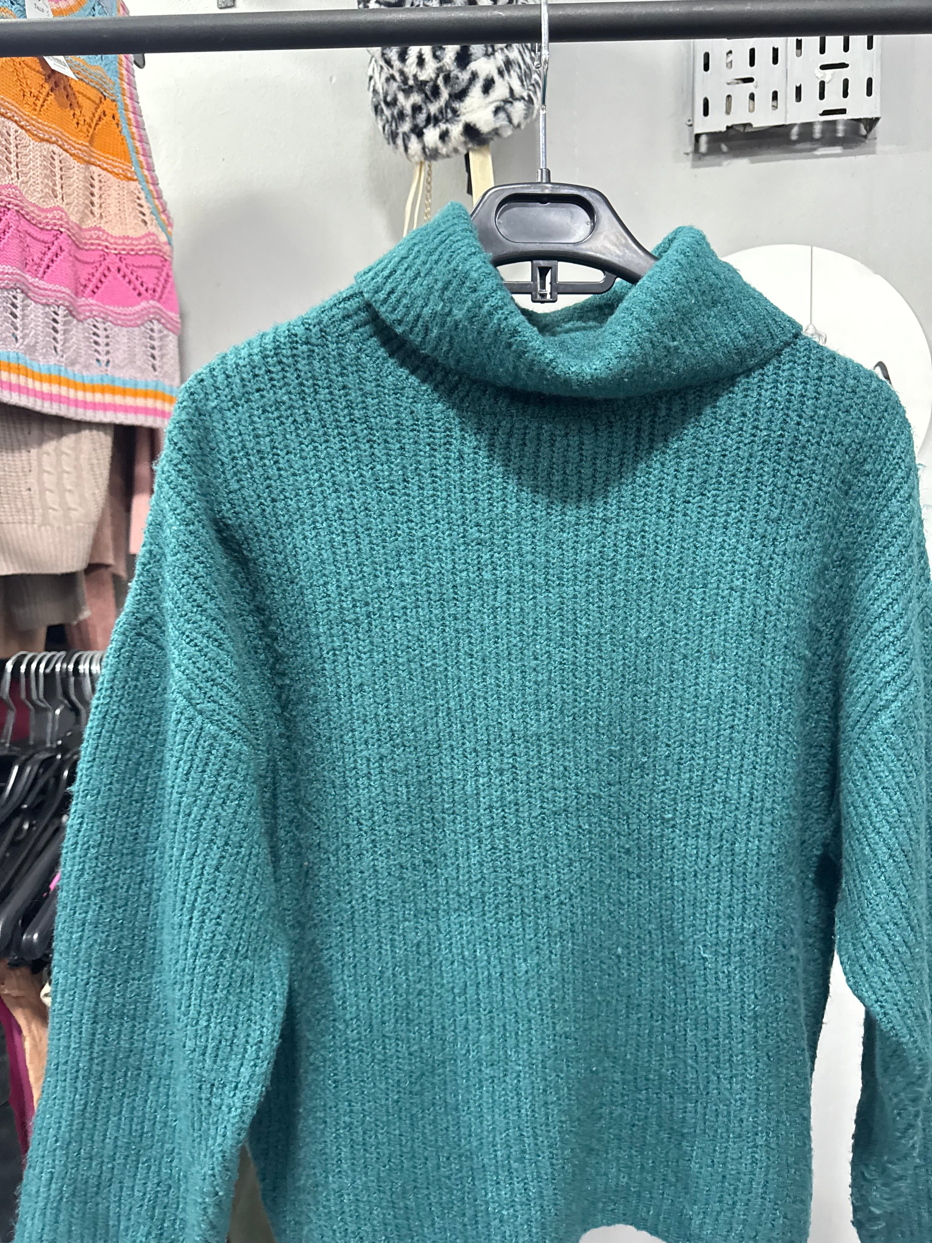 Polera verde petróleo