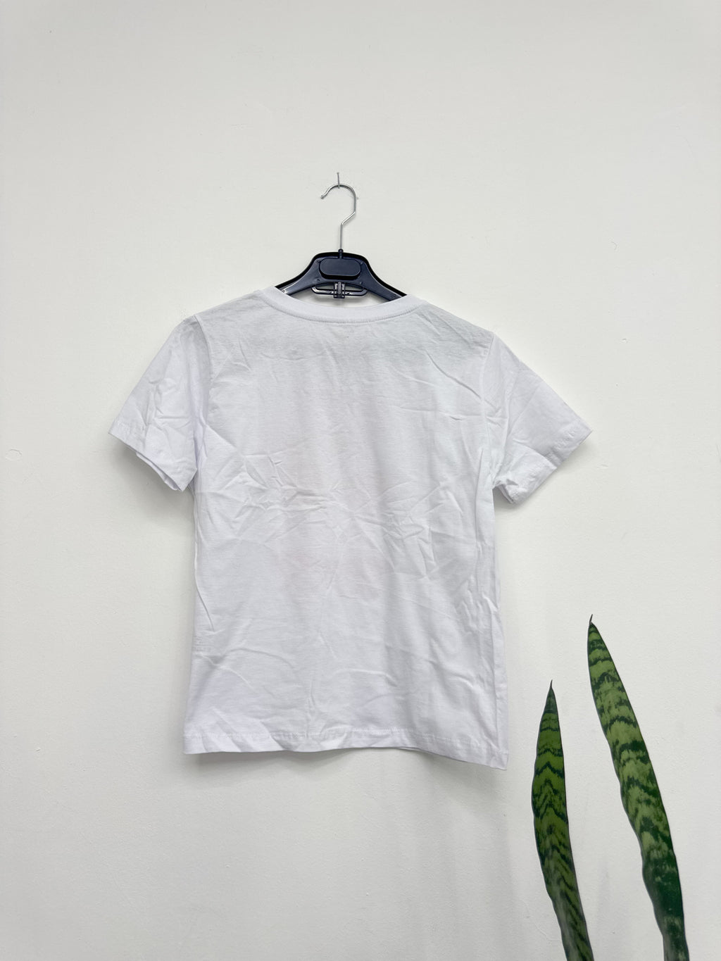 Remera NUEVA blanca con diseño de lentes