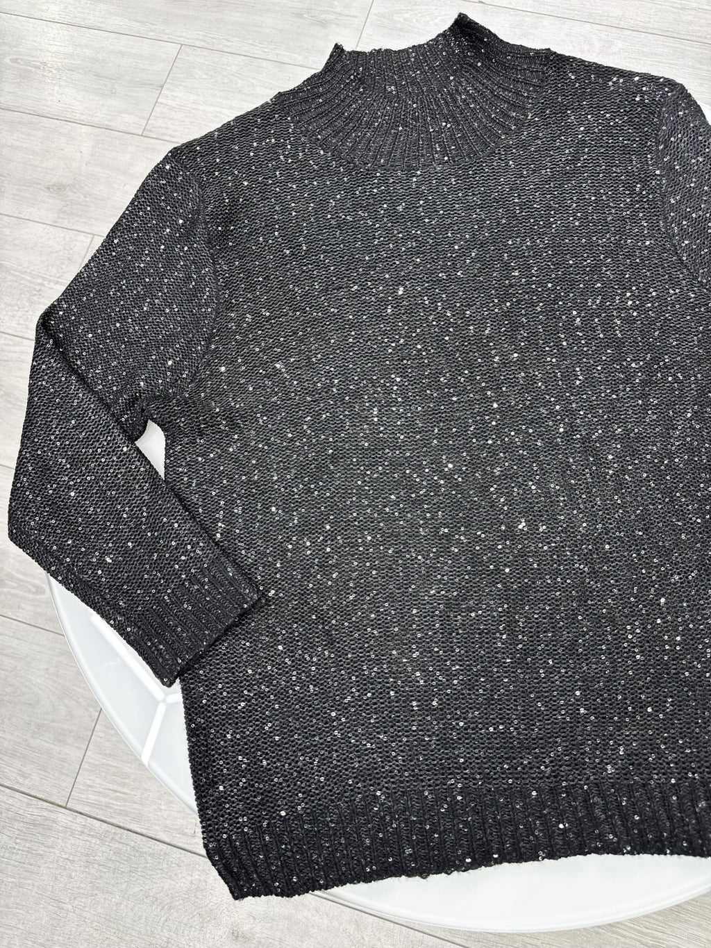 Buzo negro de lentejuelas talle XS