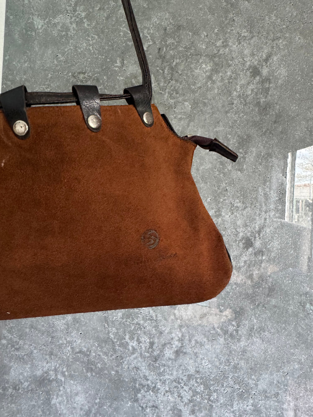 Cartera de cuero marrón