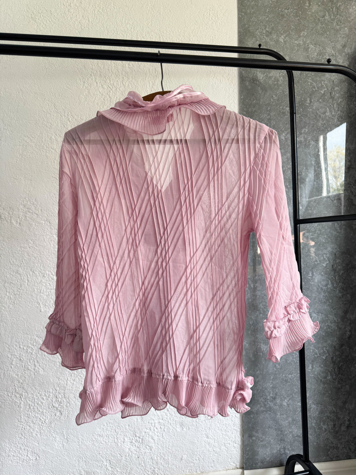 Blusa rosa con volados