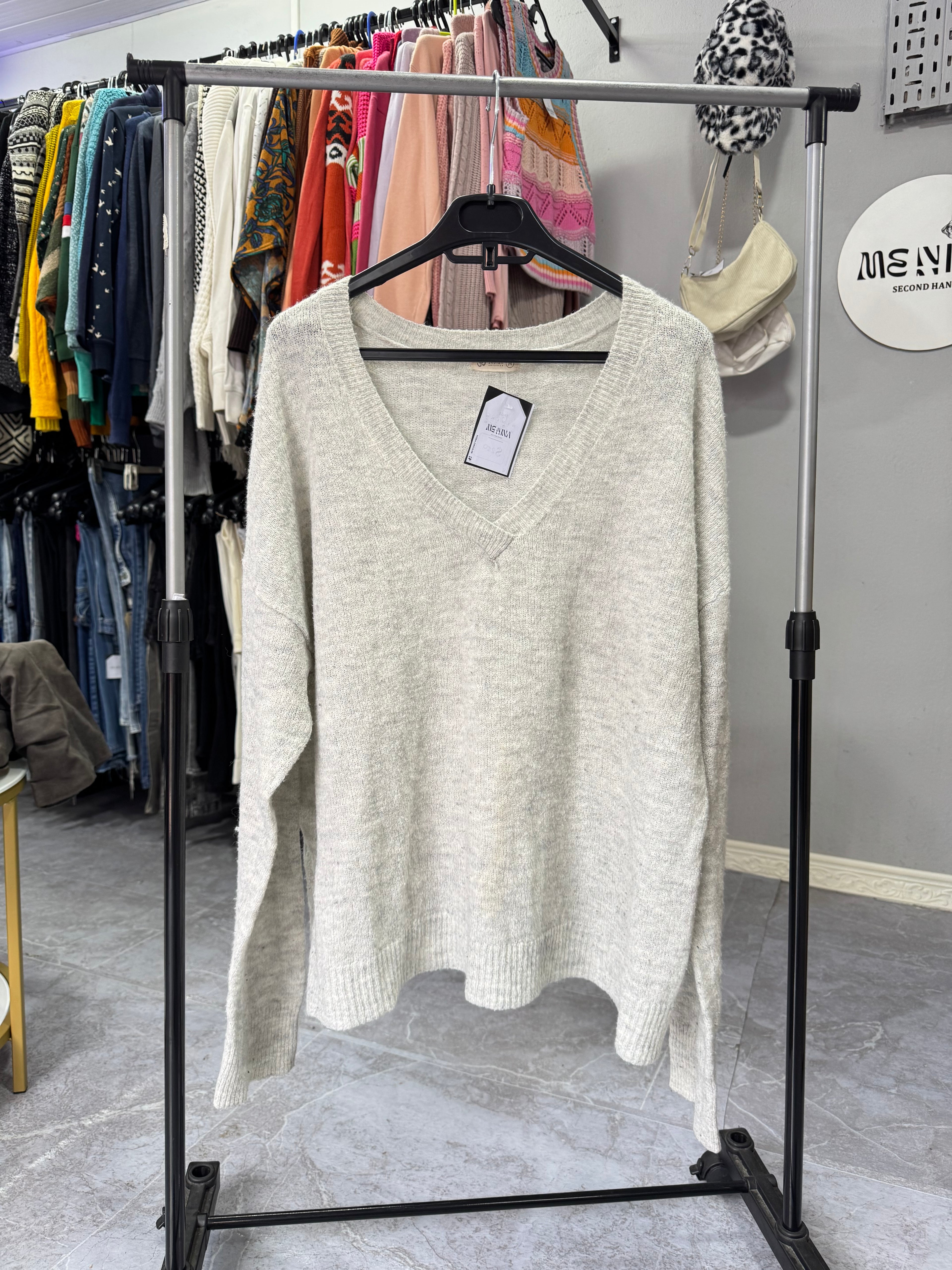 Buzo gris talle M
