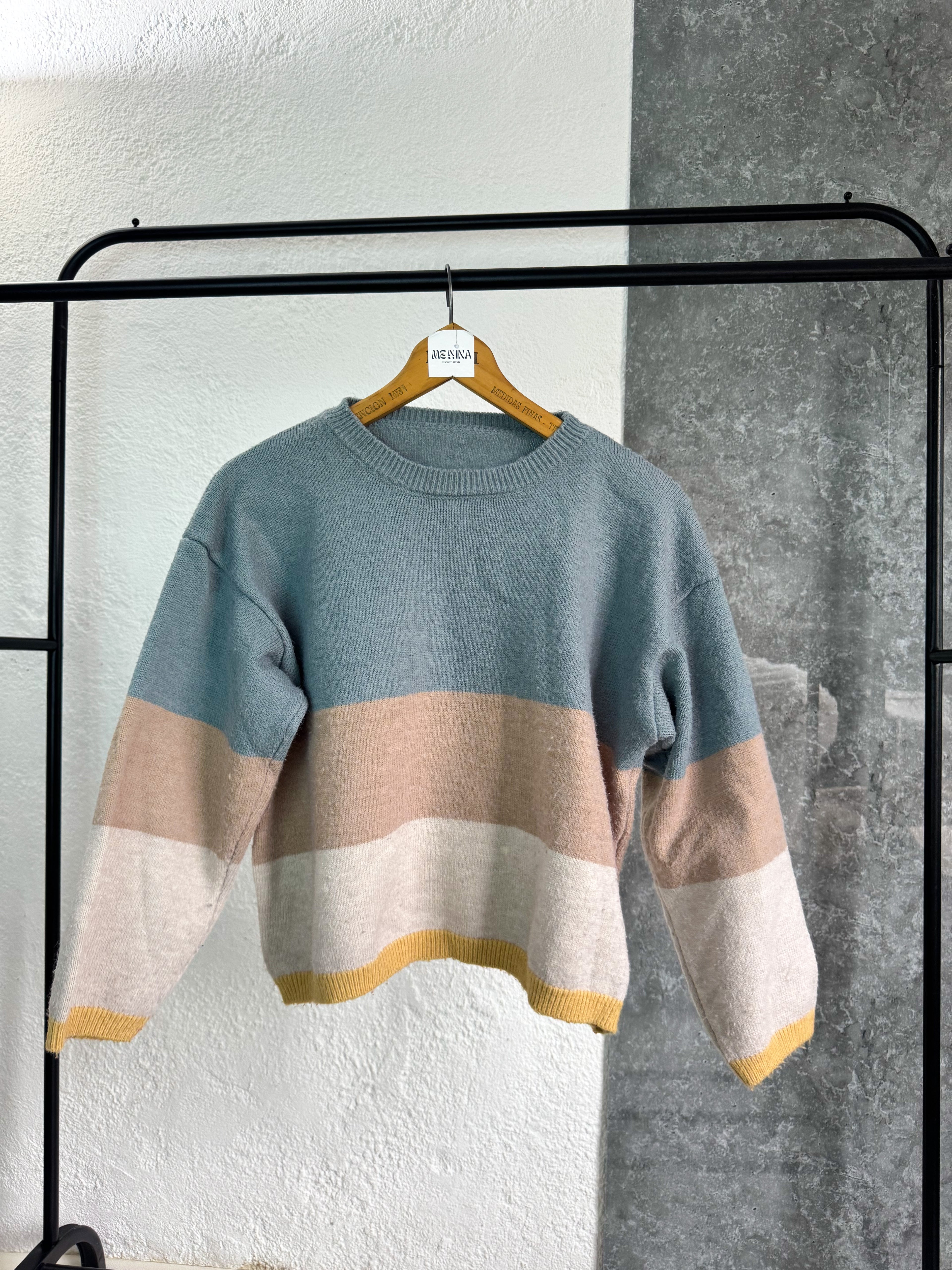 Buzo celeste y beige