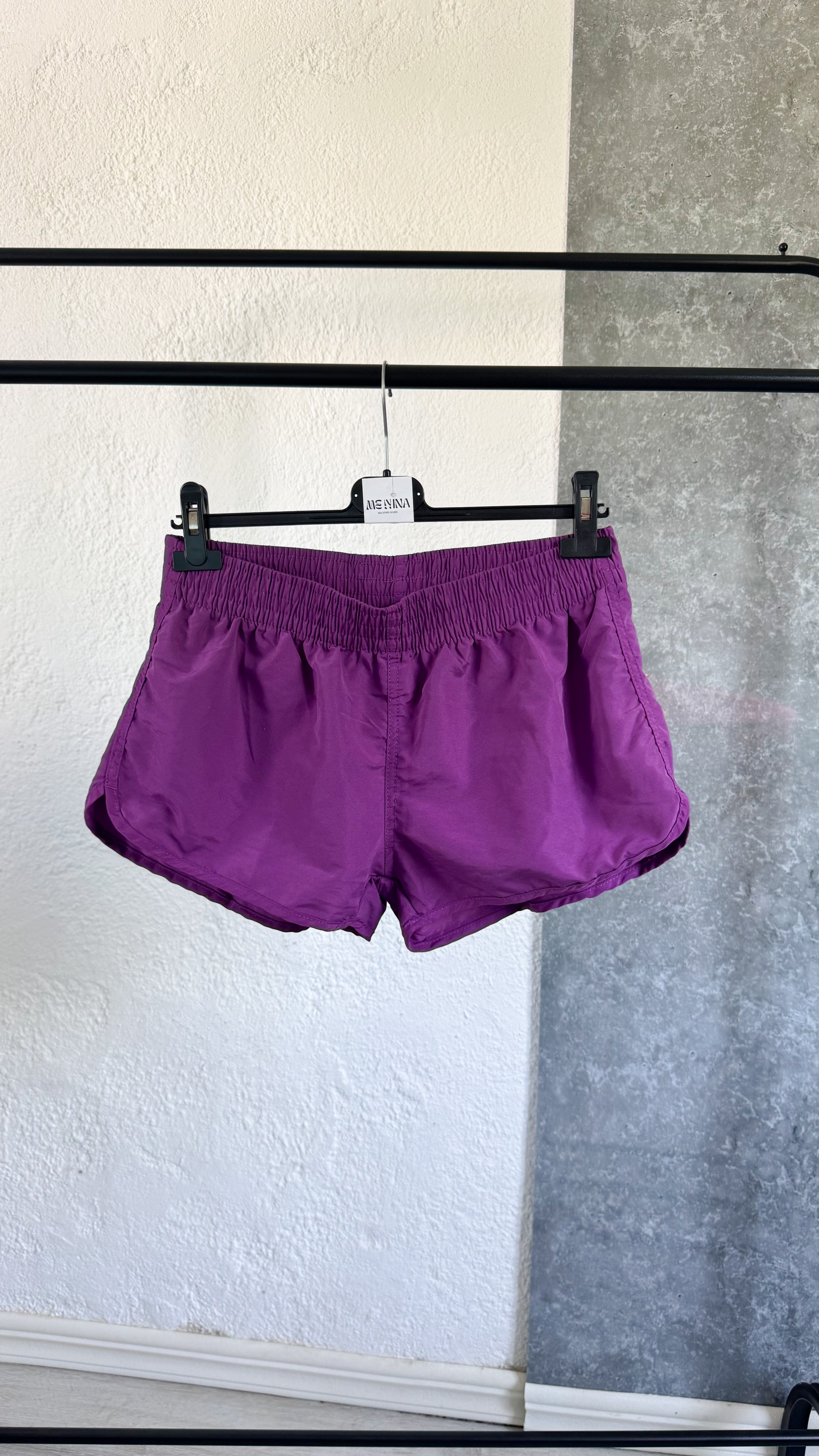 Short lila deportivo