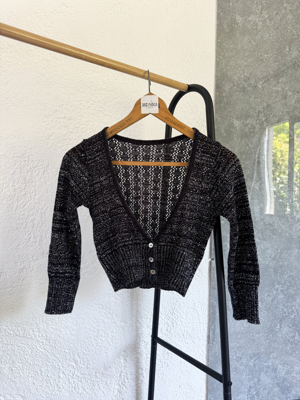 Saquito negro brilloso