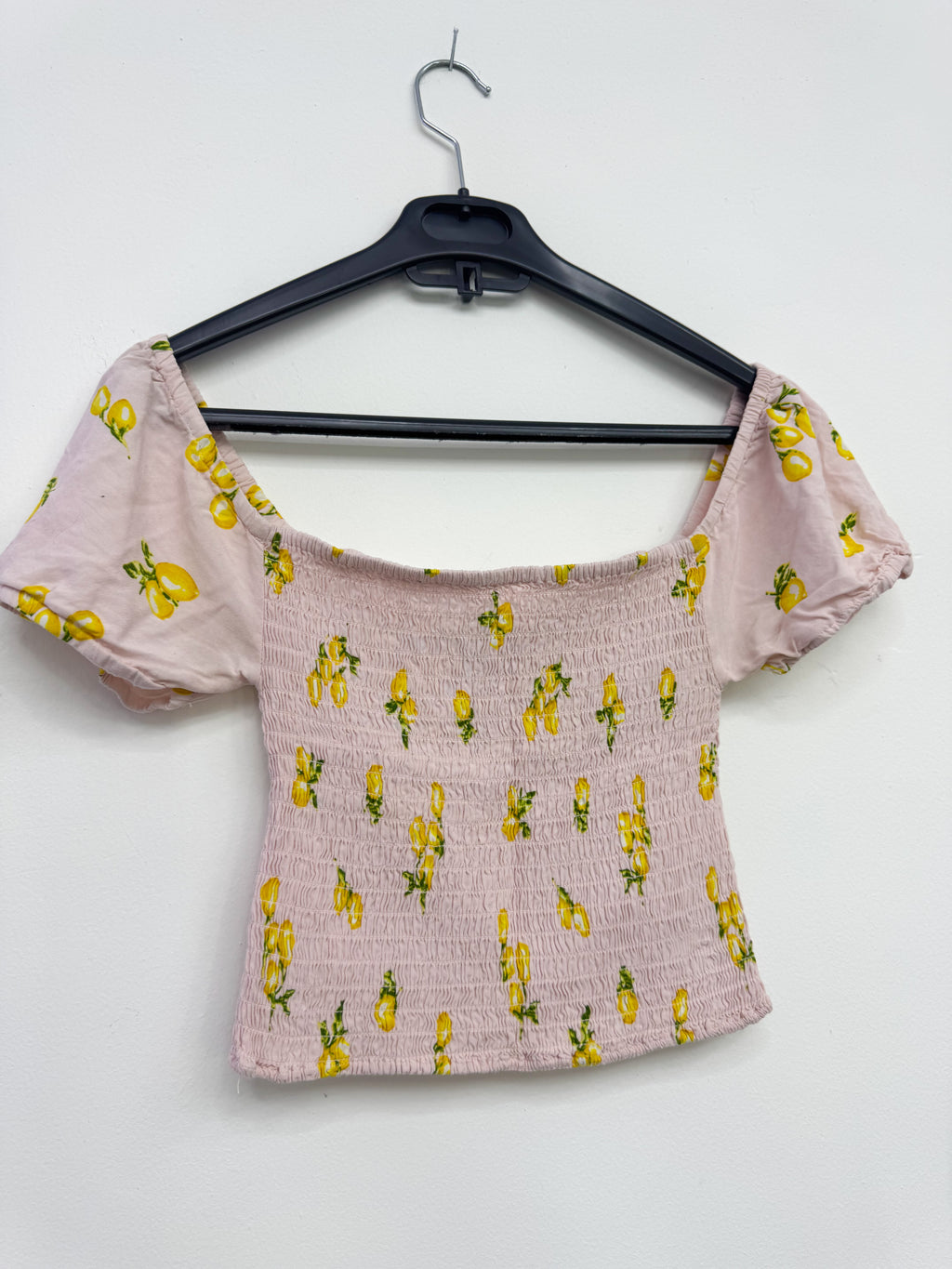 Top rosado tela corrugada