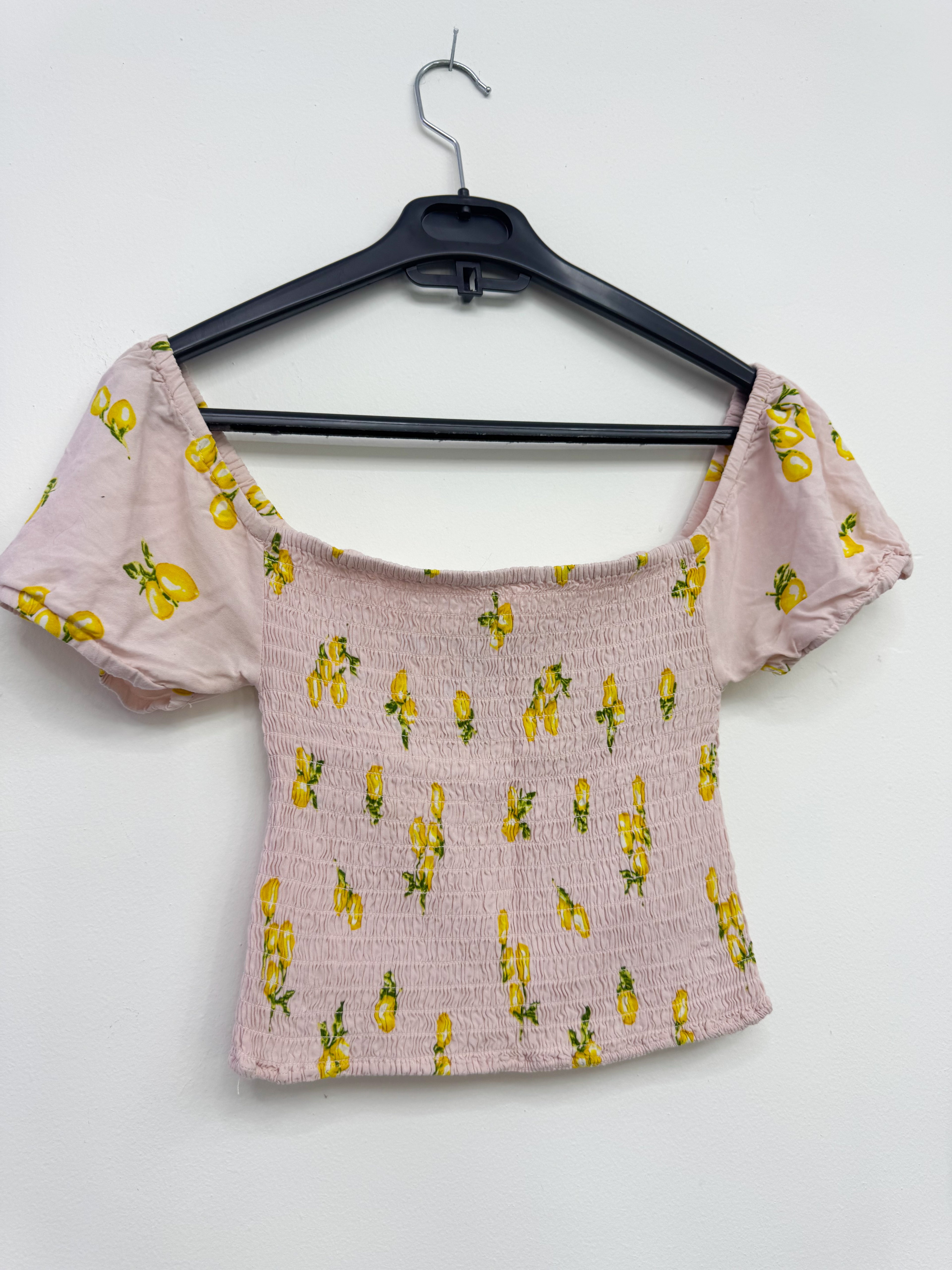 Top rosado tela corrugada