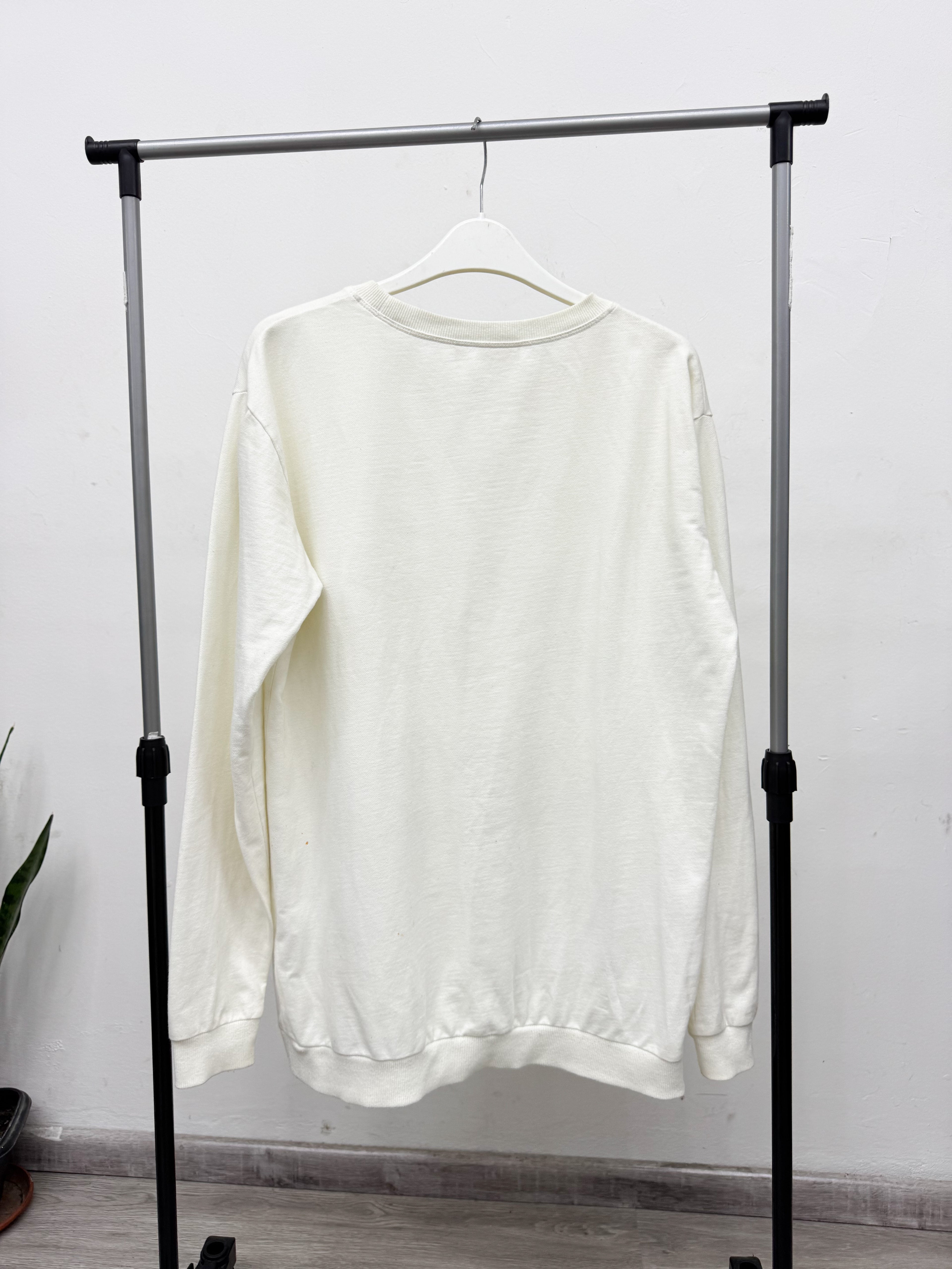 Buzo blanco de algodón *con detalle