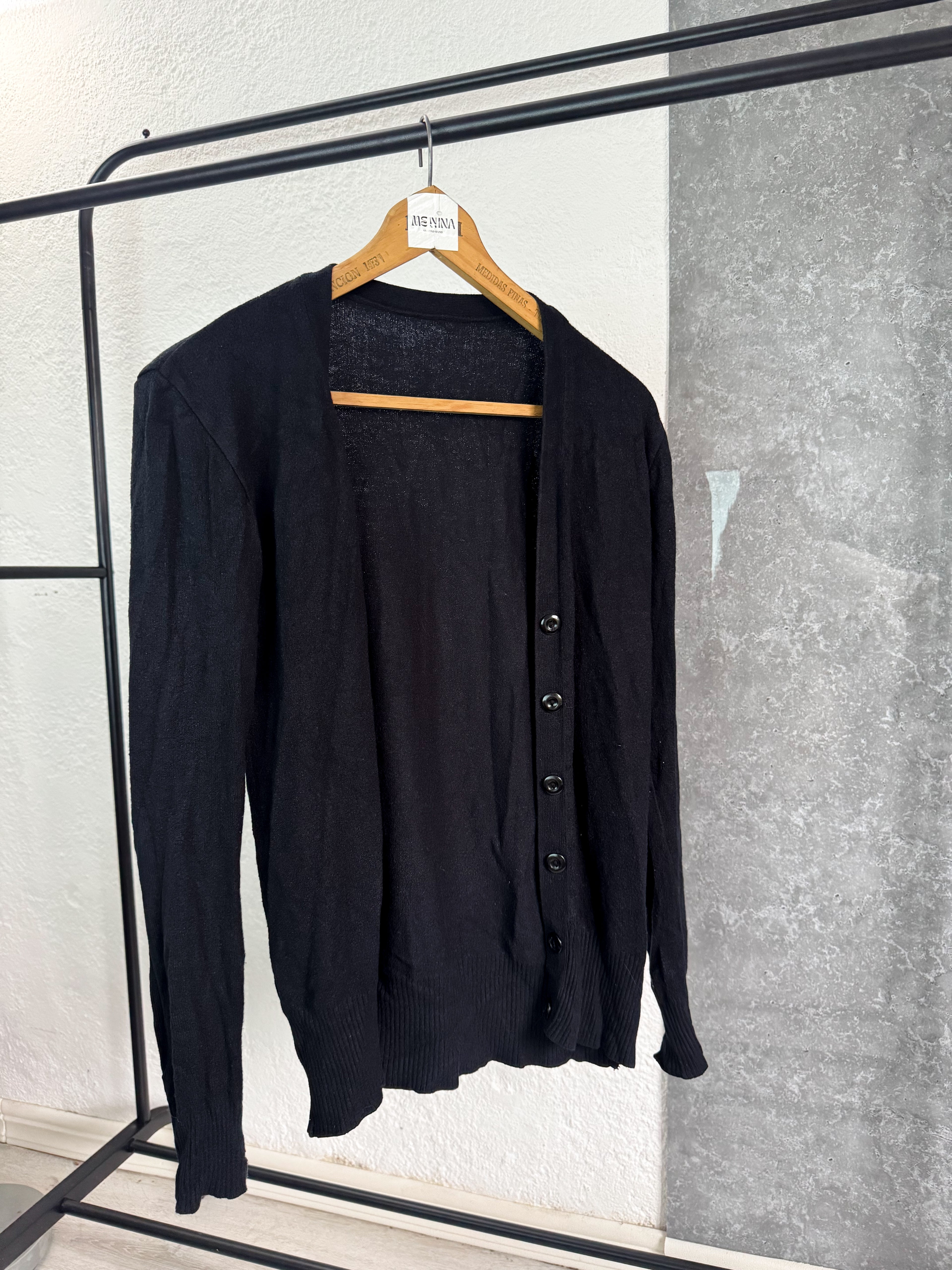 Saco negro con botones