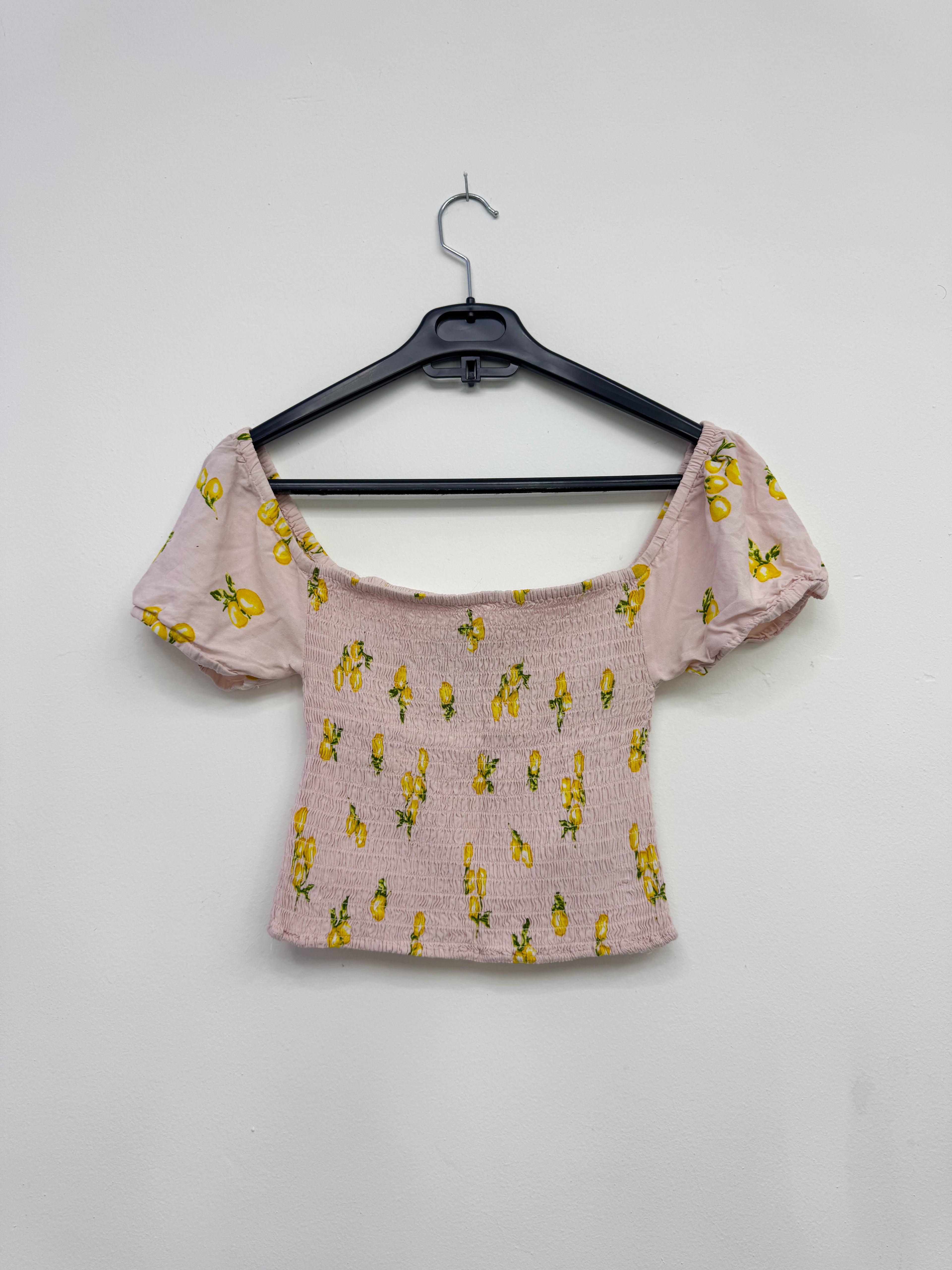 Top rosado tela corrugada