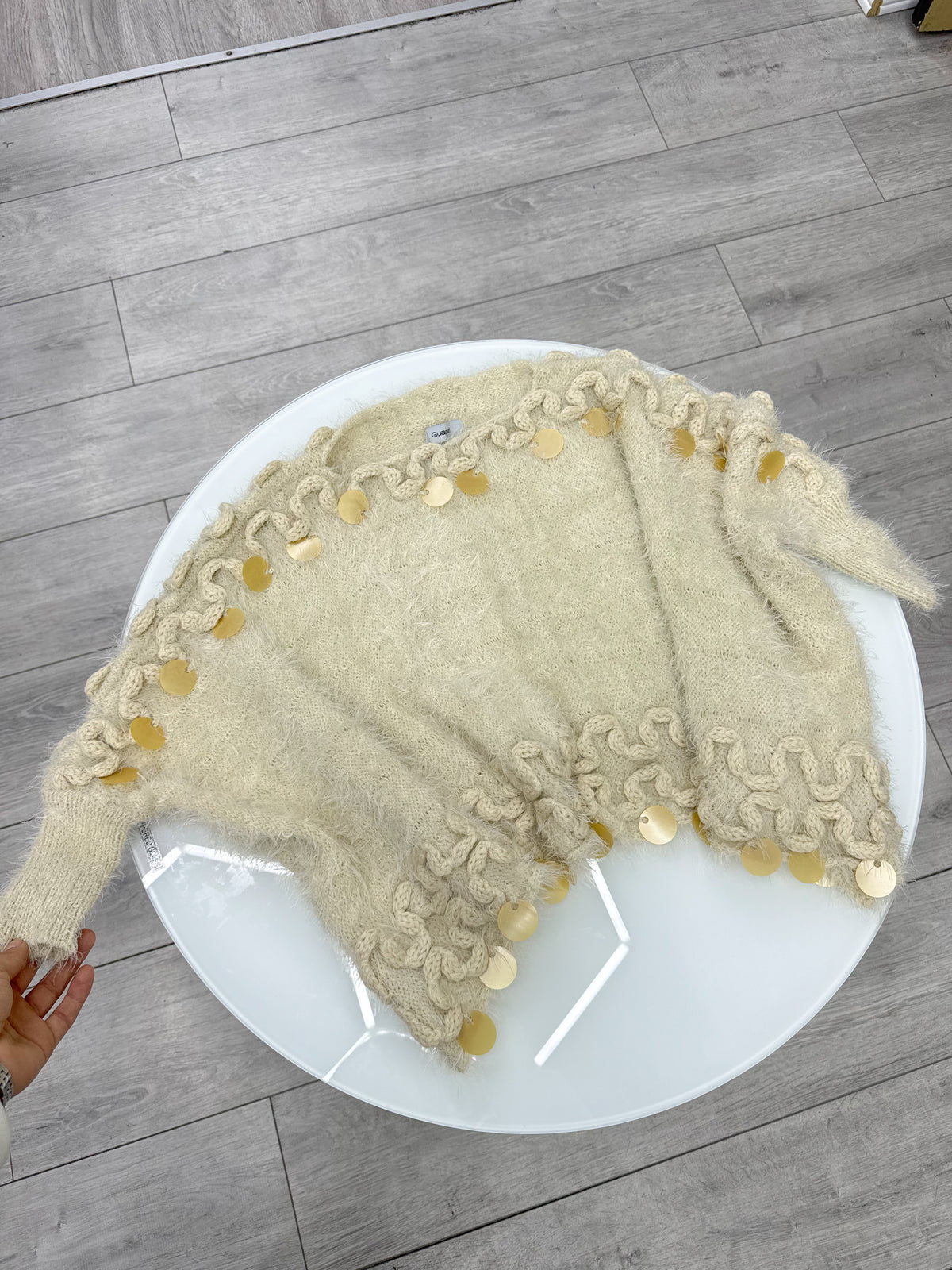 Buzo beige talle único con puños
