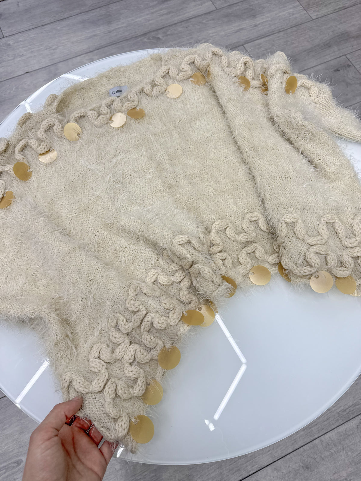 Buzo beige talle único con puños