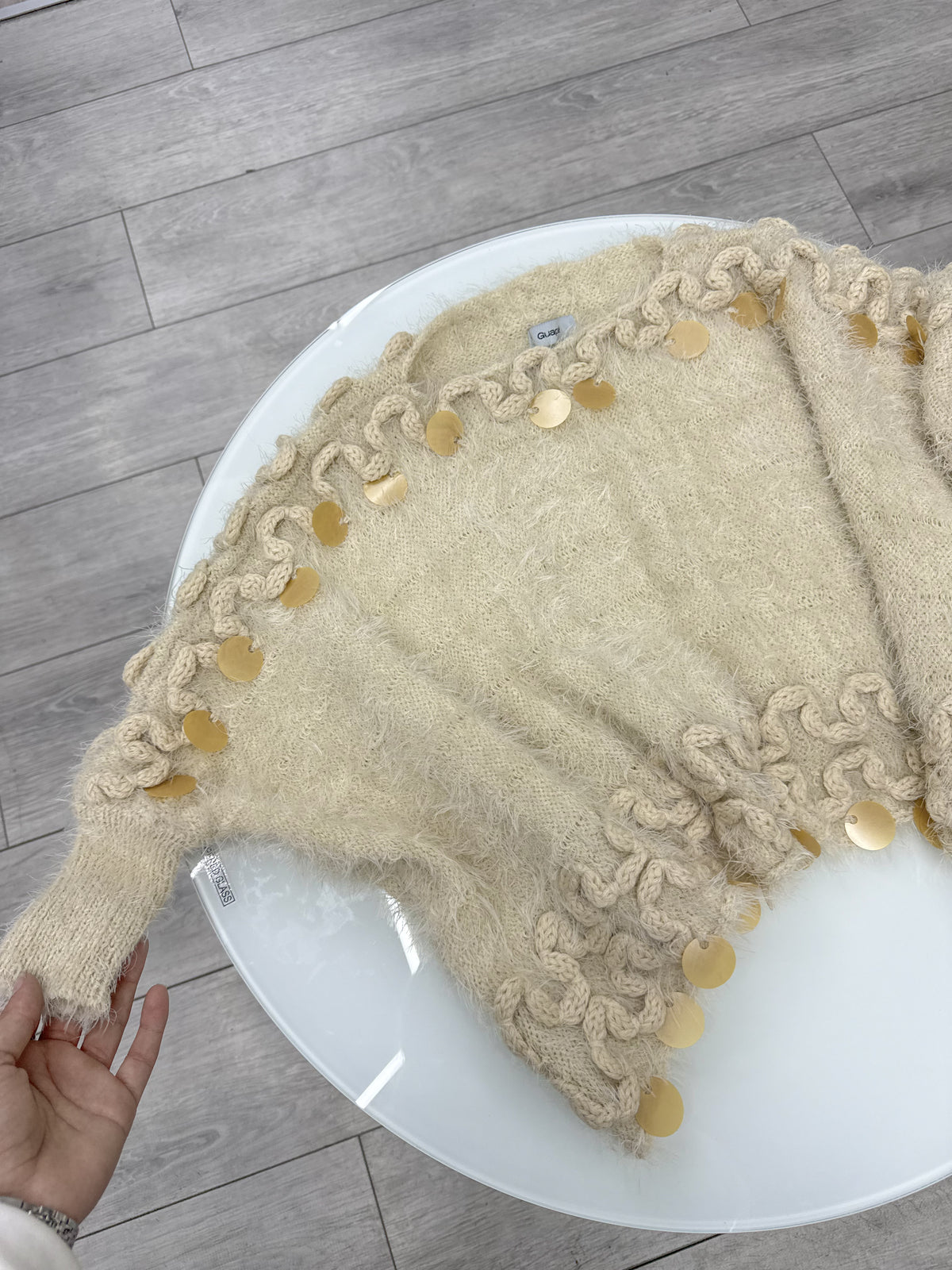 Buzo beige talle único con puños