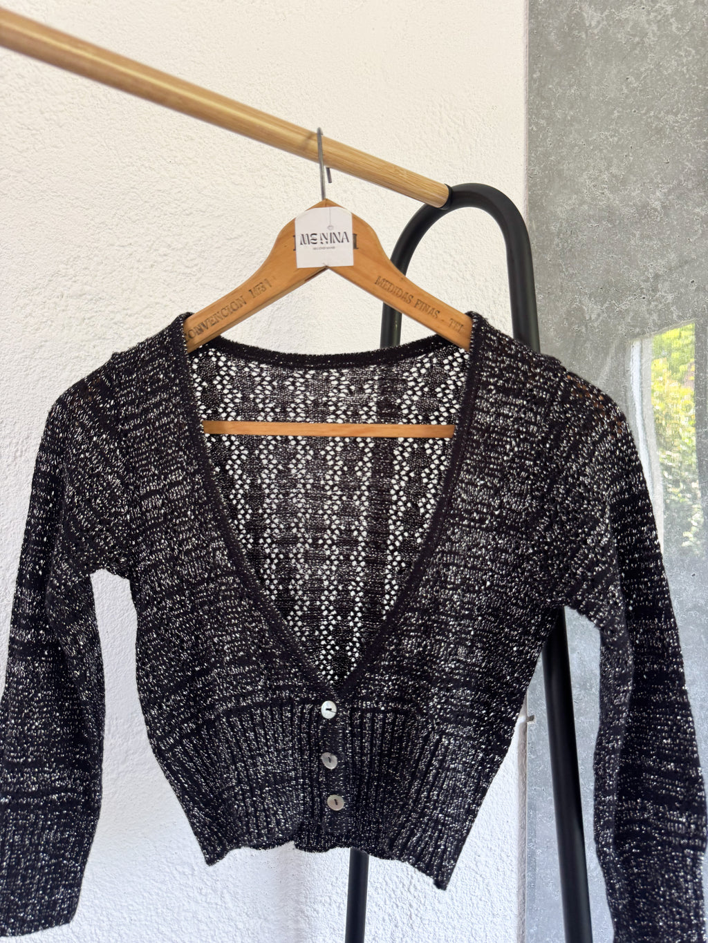 Saquito negro brilloso