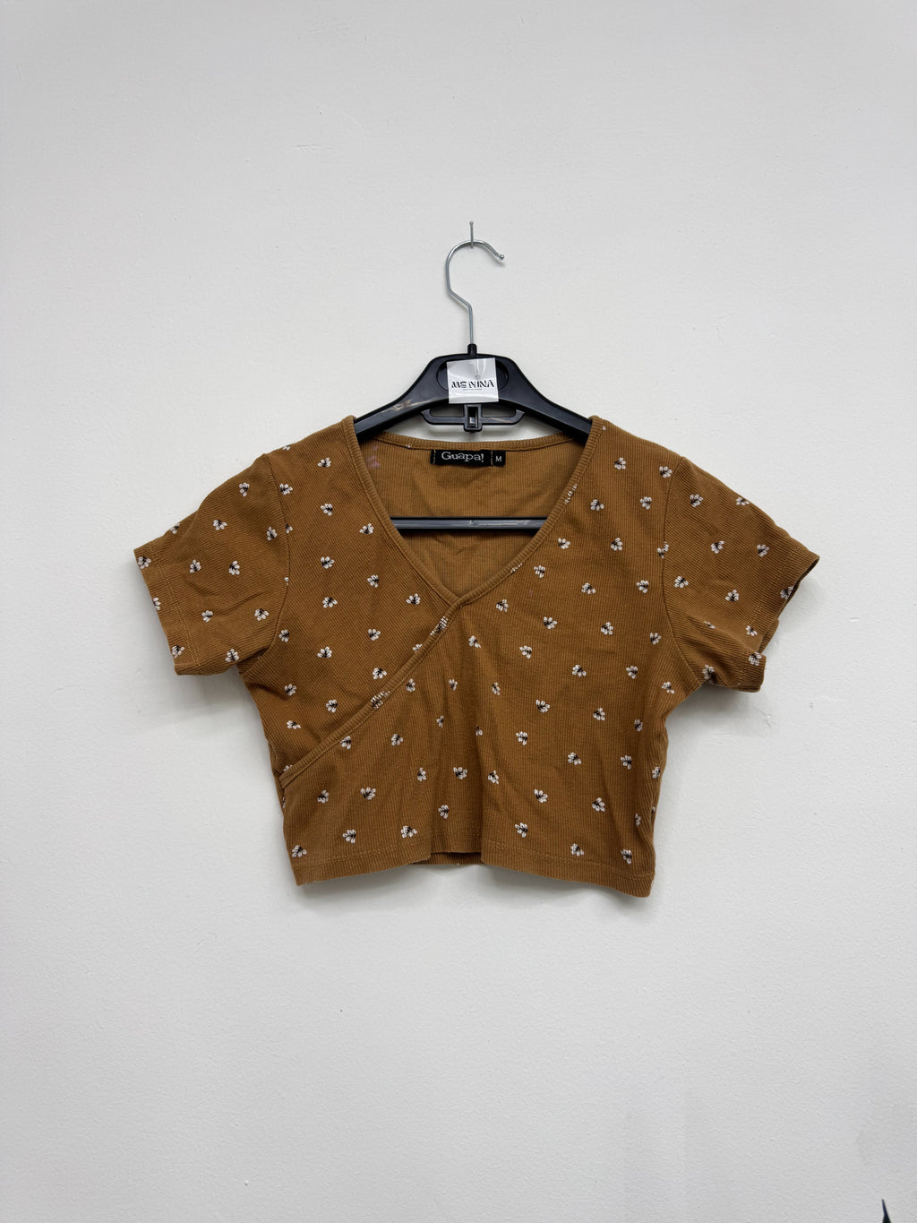 Top marrón de flores *con detalle mancha