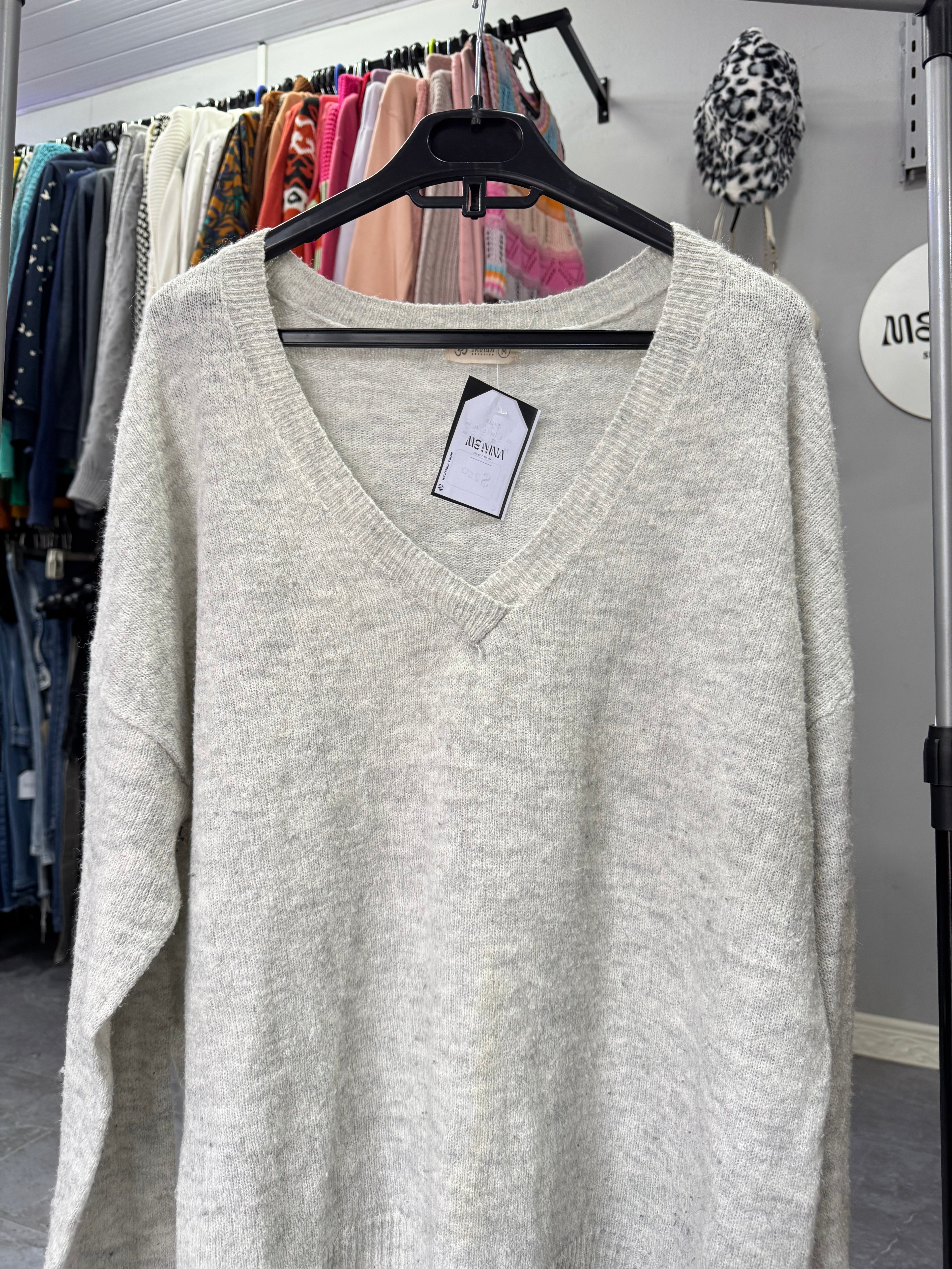 Buzo gris talle M