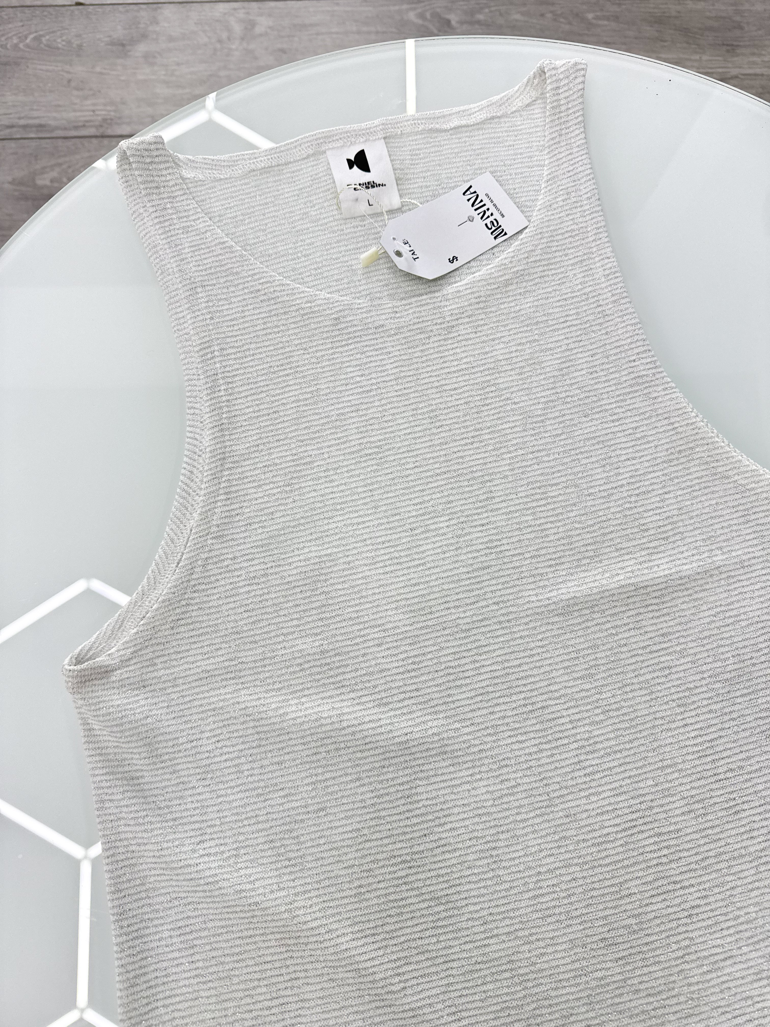 Músculos blanca brillosa talle L