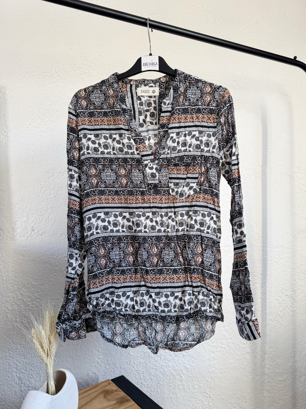 Blusa estampada manga larga