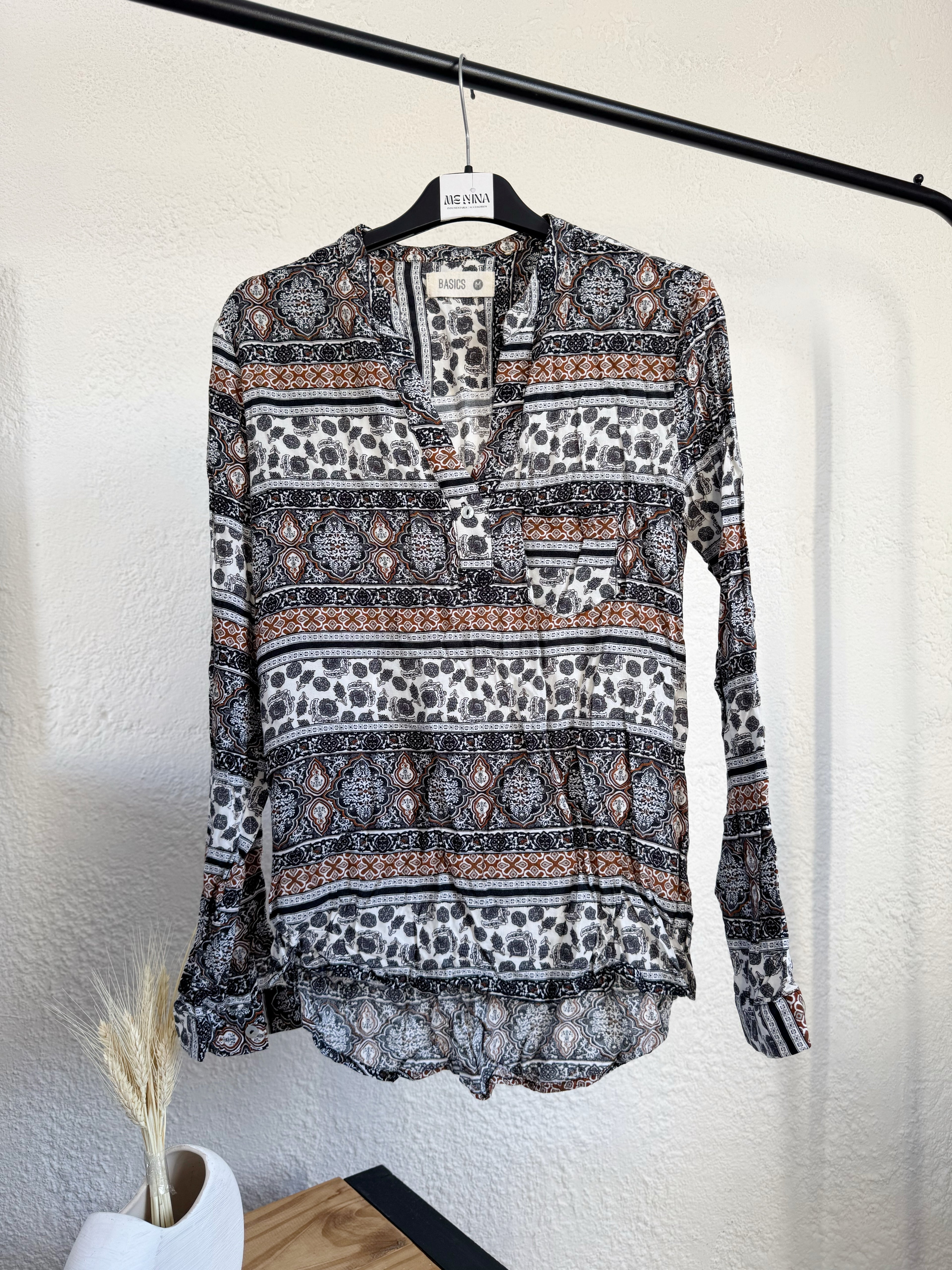 Blusa estampada manga larga