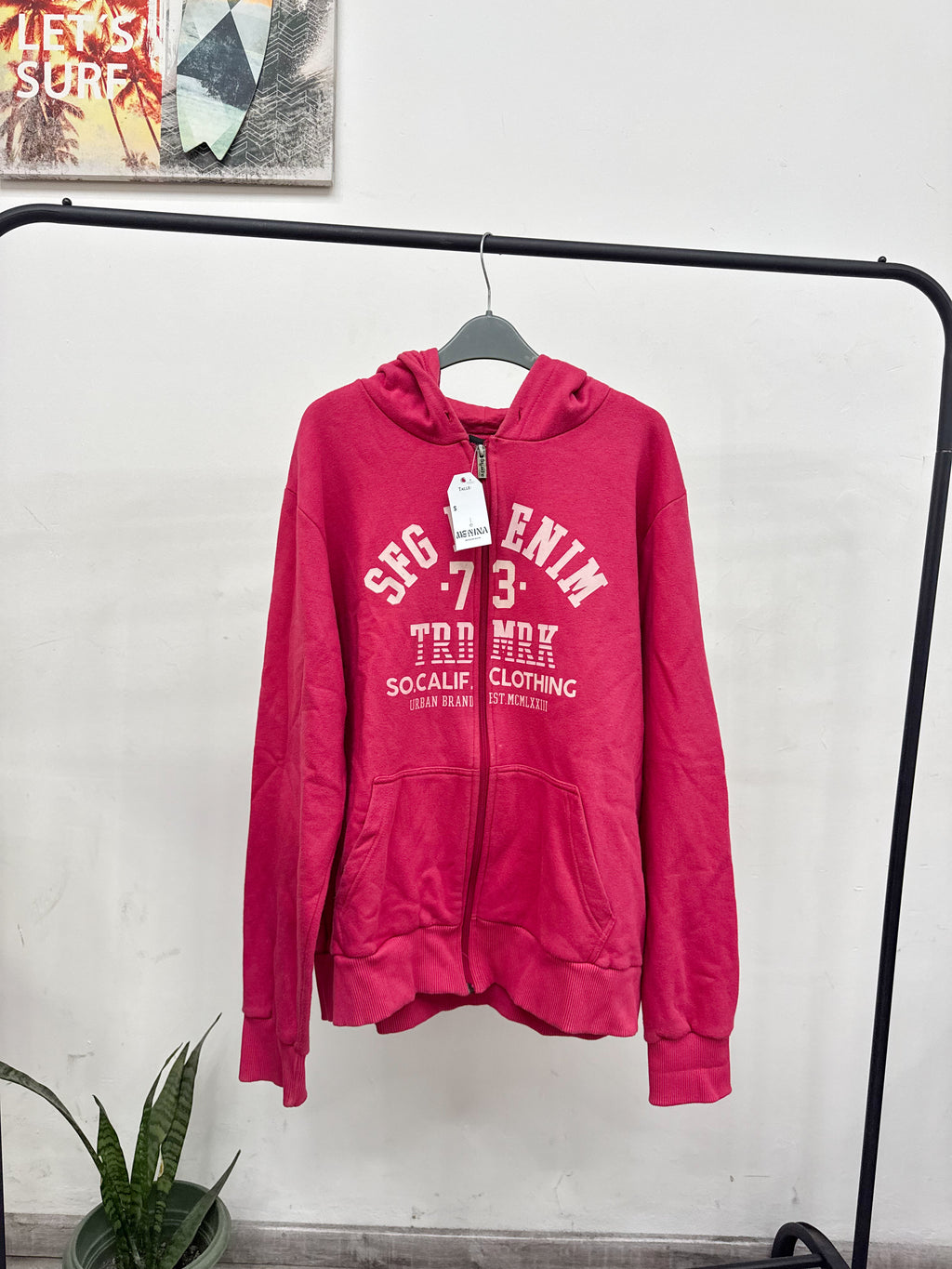 Campera rosada deportiva