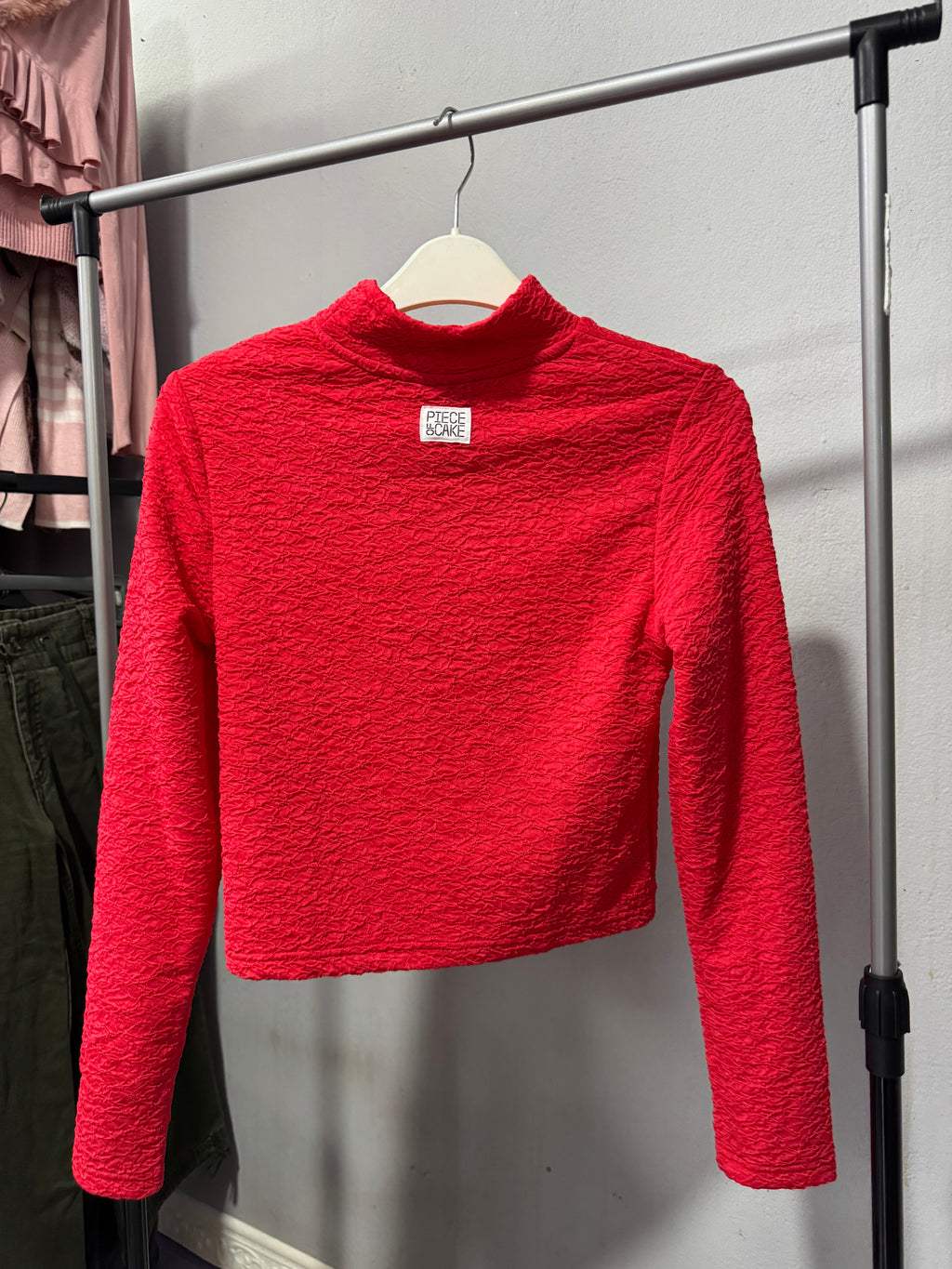 Top rojo de mangas largas