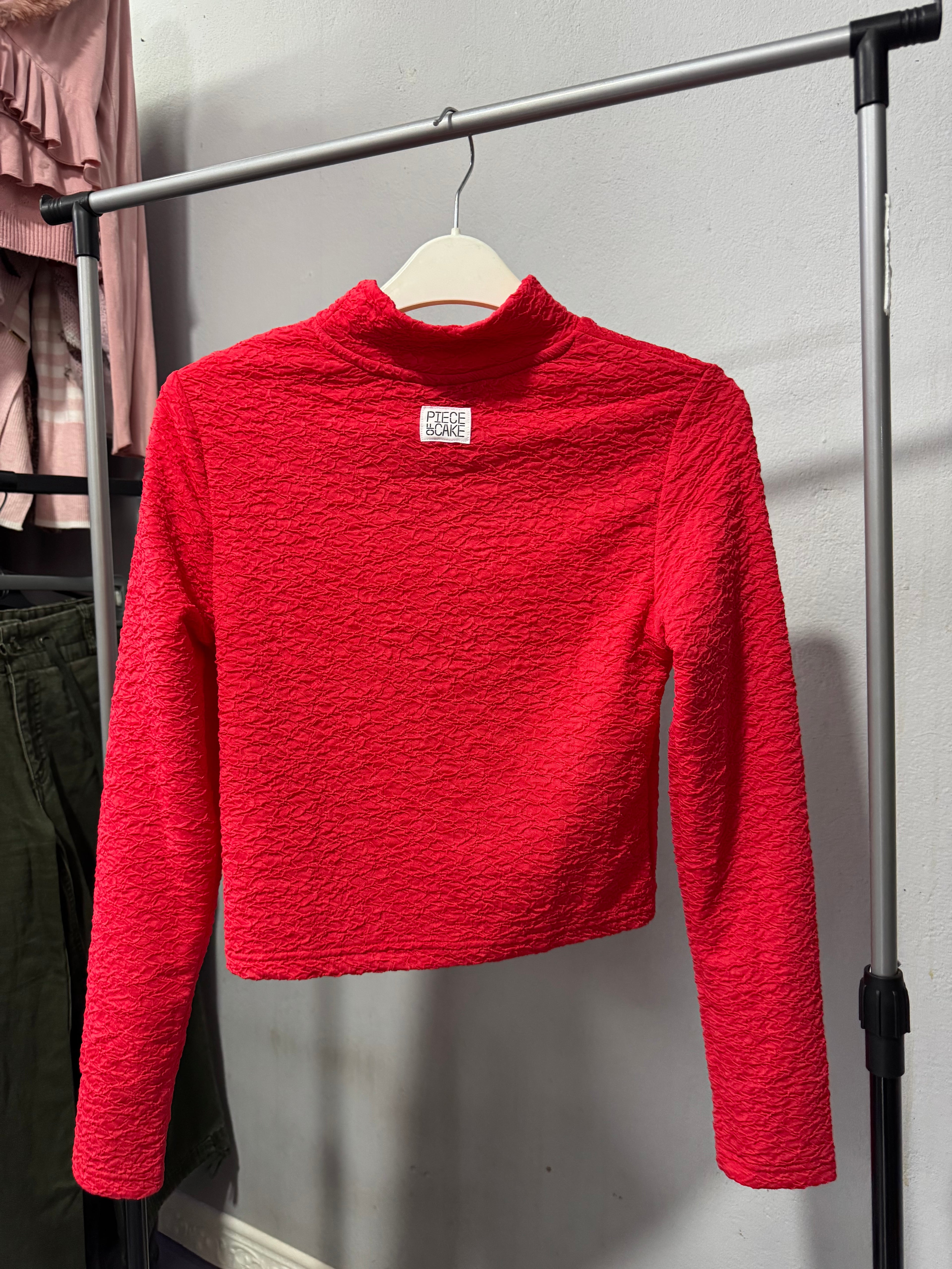 Top rojo de mangas largas