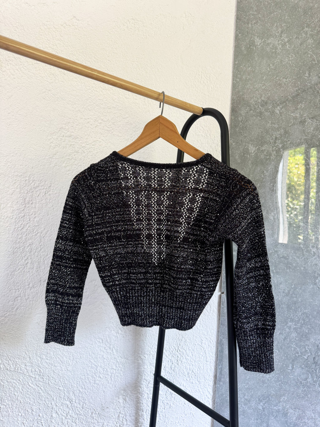 Saquito negro brilloso