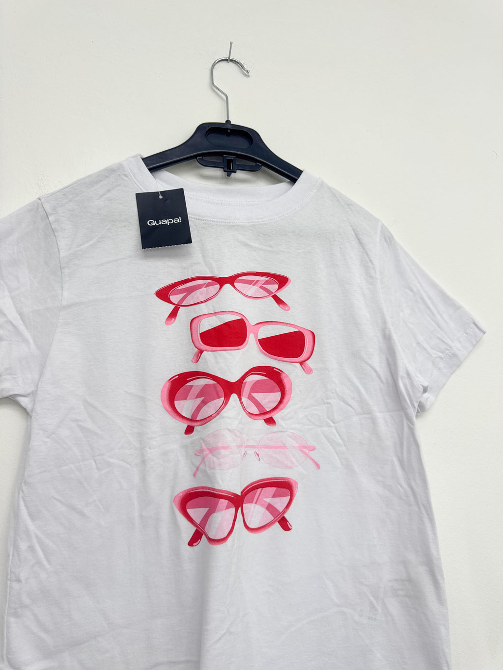 Remera NUEVA blanca con diseño de lentes