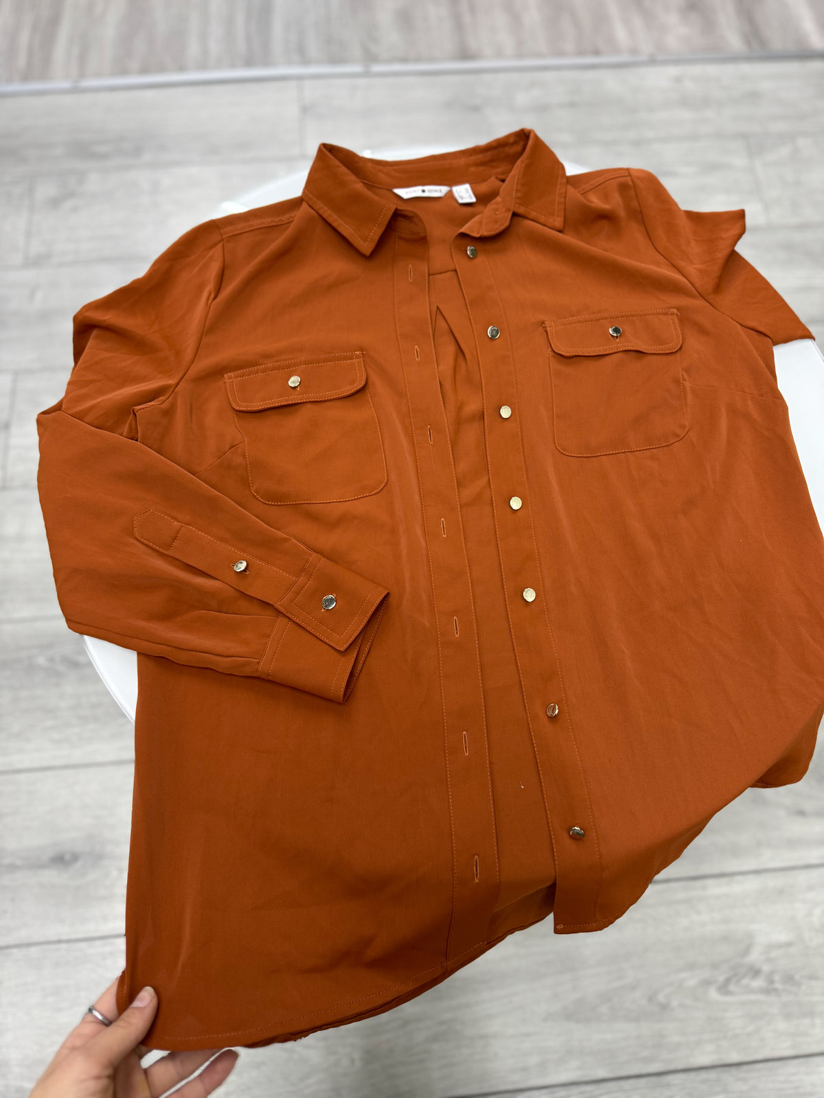 Camisa color terracota talle M