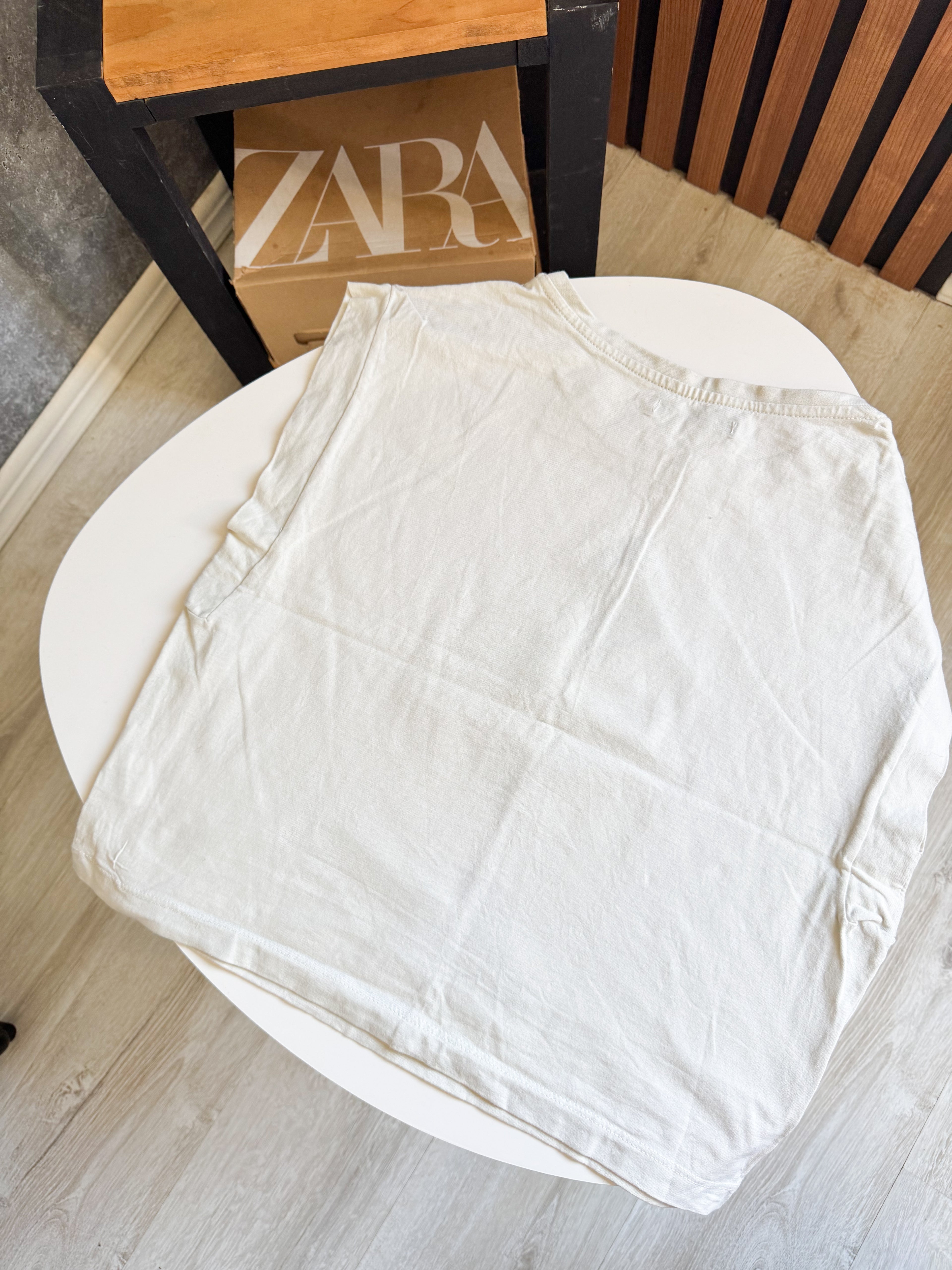 Remerita beige con diseño