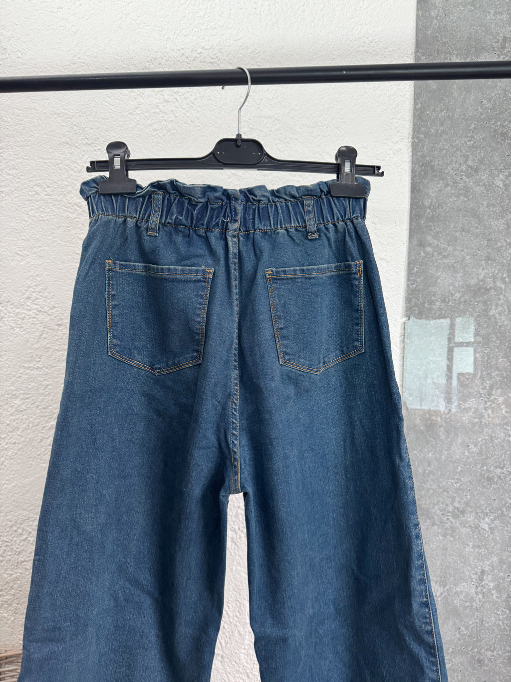 Jean talle 24 tiro alto