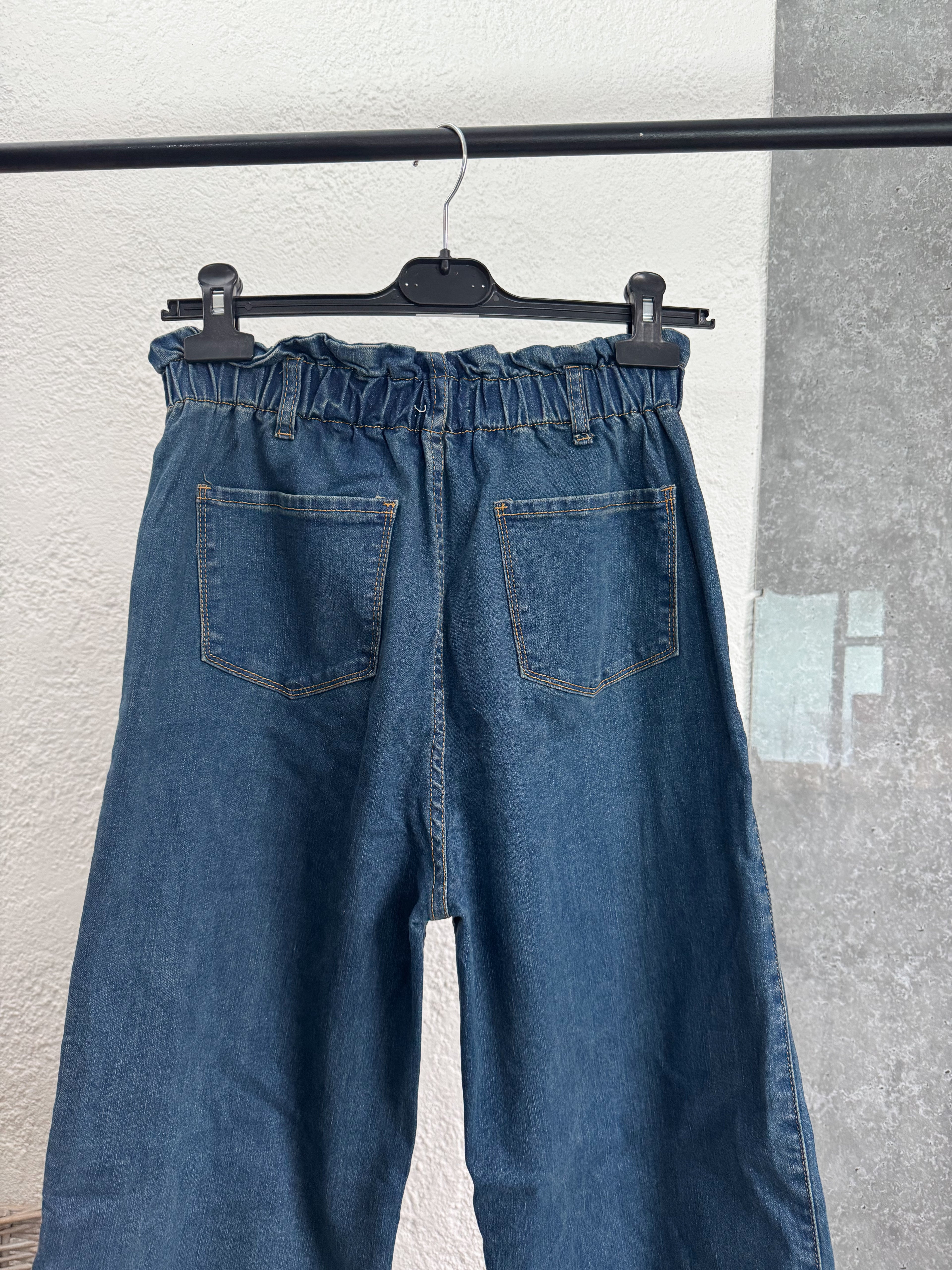 Jean talle 24 tiro alto