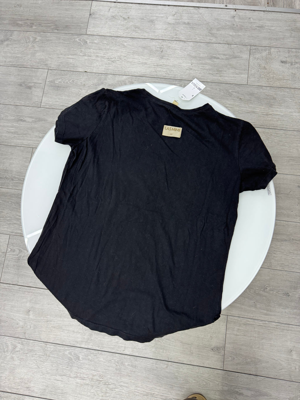 Remera negra con mariposa talle M
