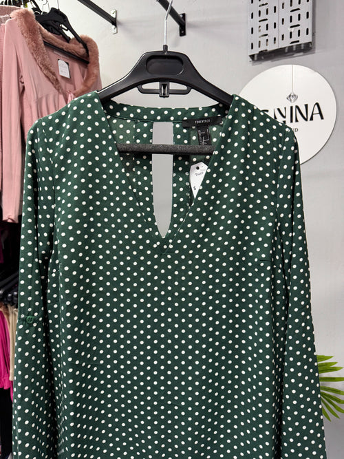 Blusa verde de lunares