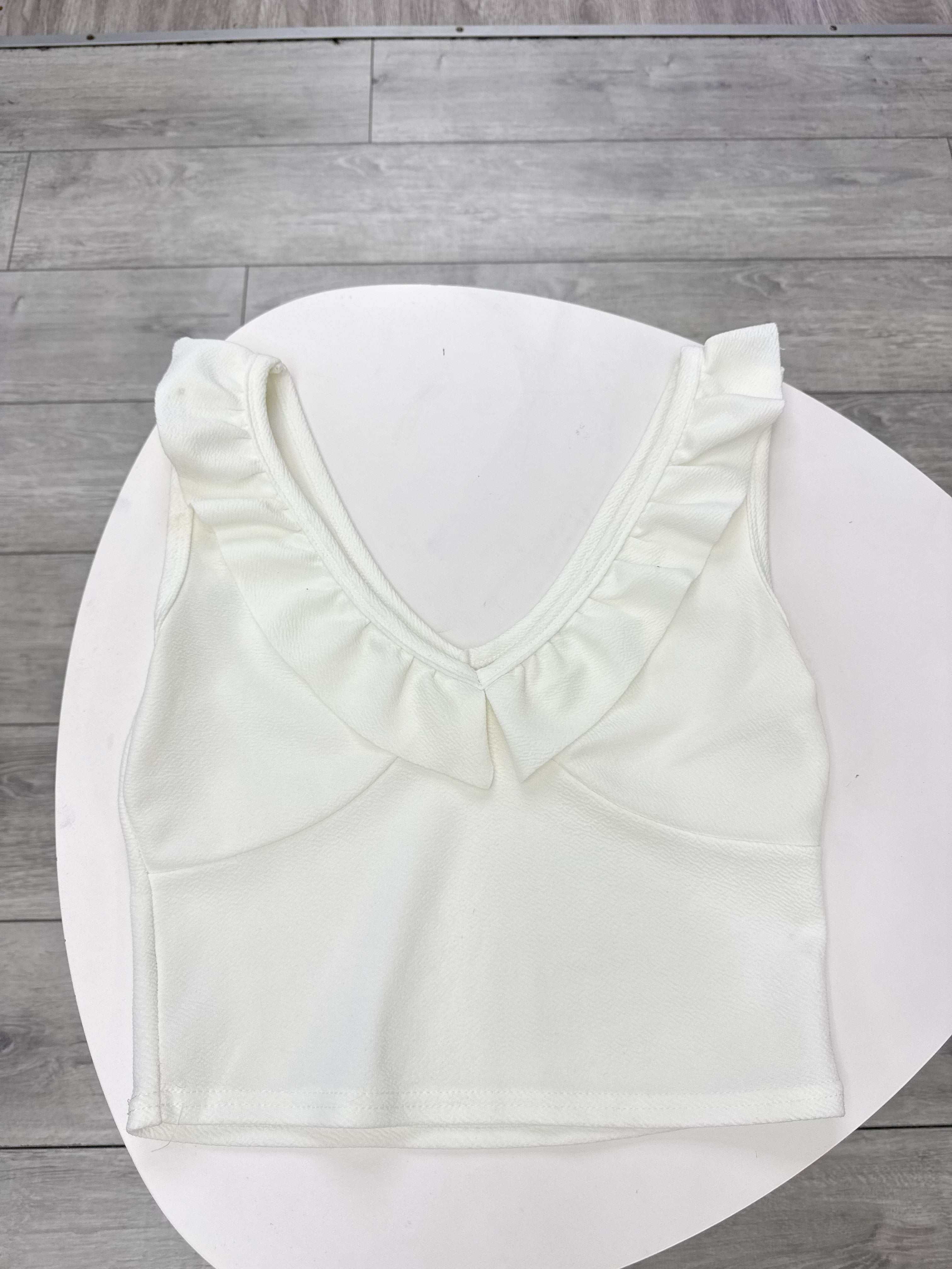 Top blanco con volados