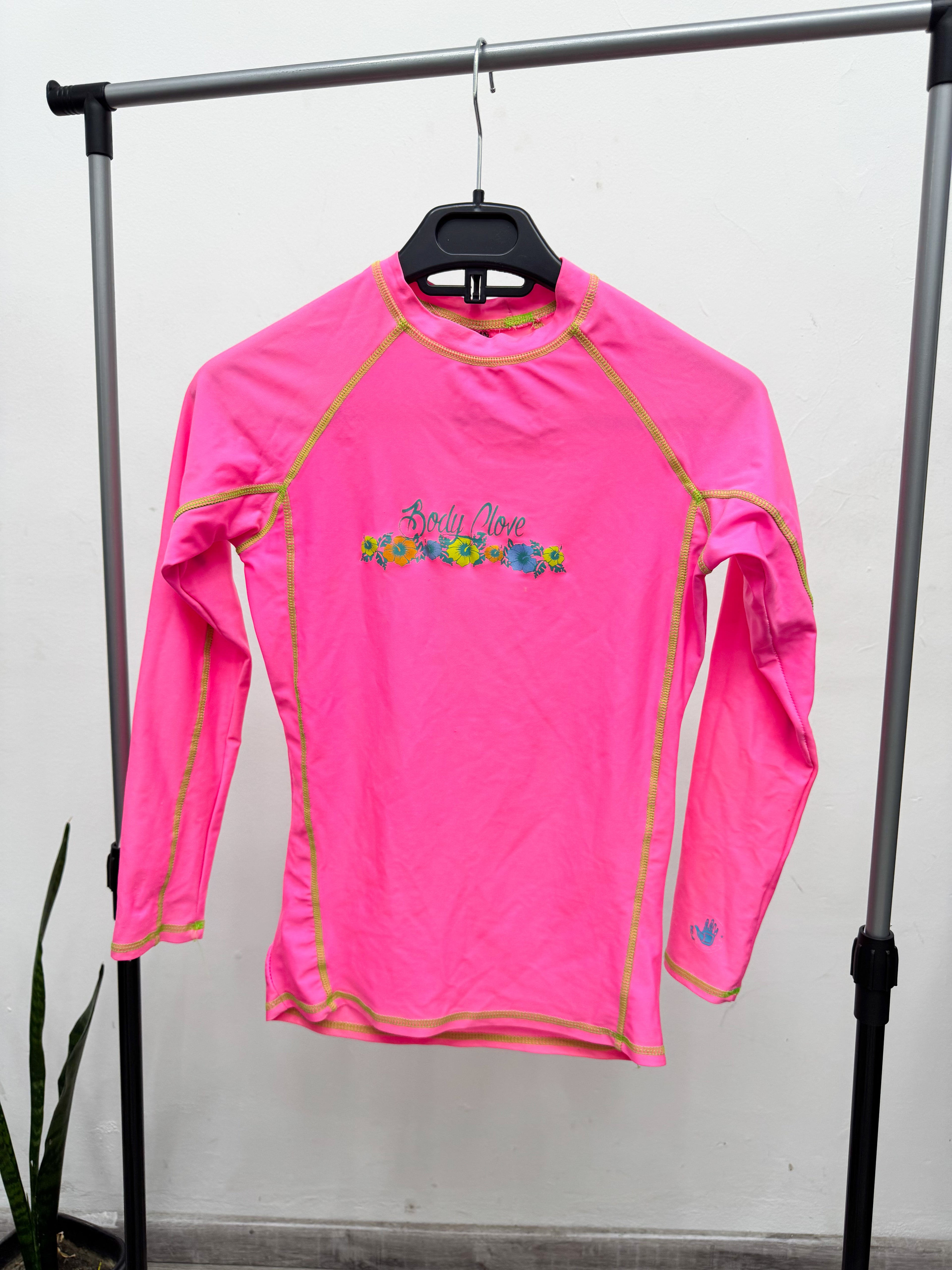 Remera rosada con protección UV