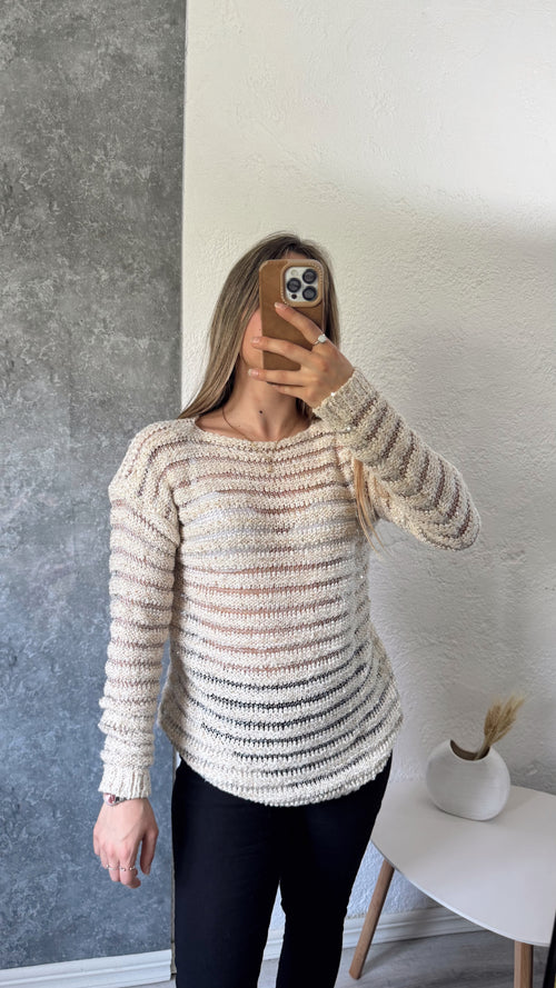 Buzo beige con transparencias