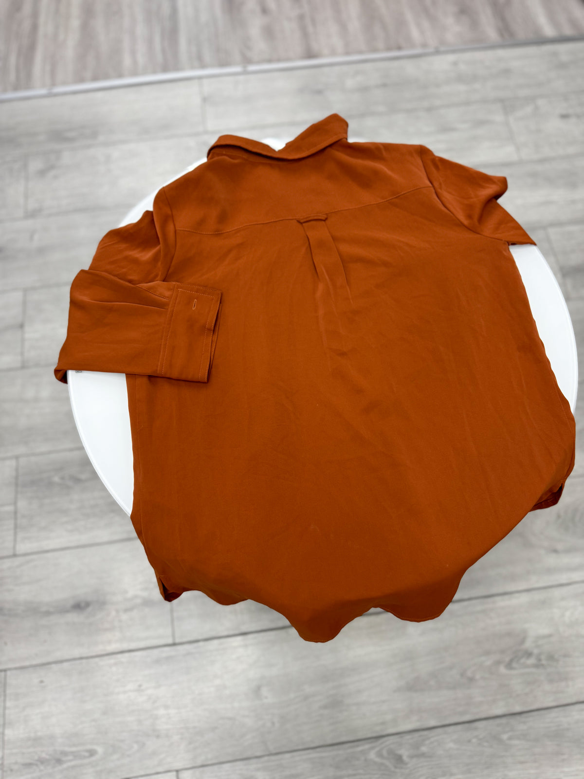 Camisa color terracota talle M