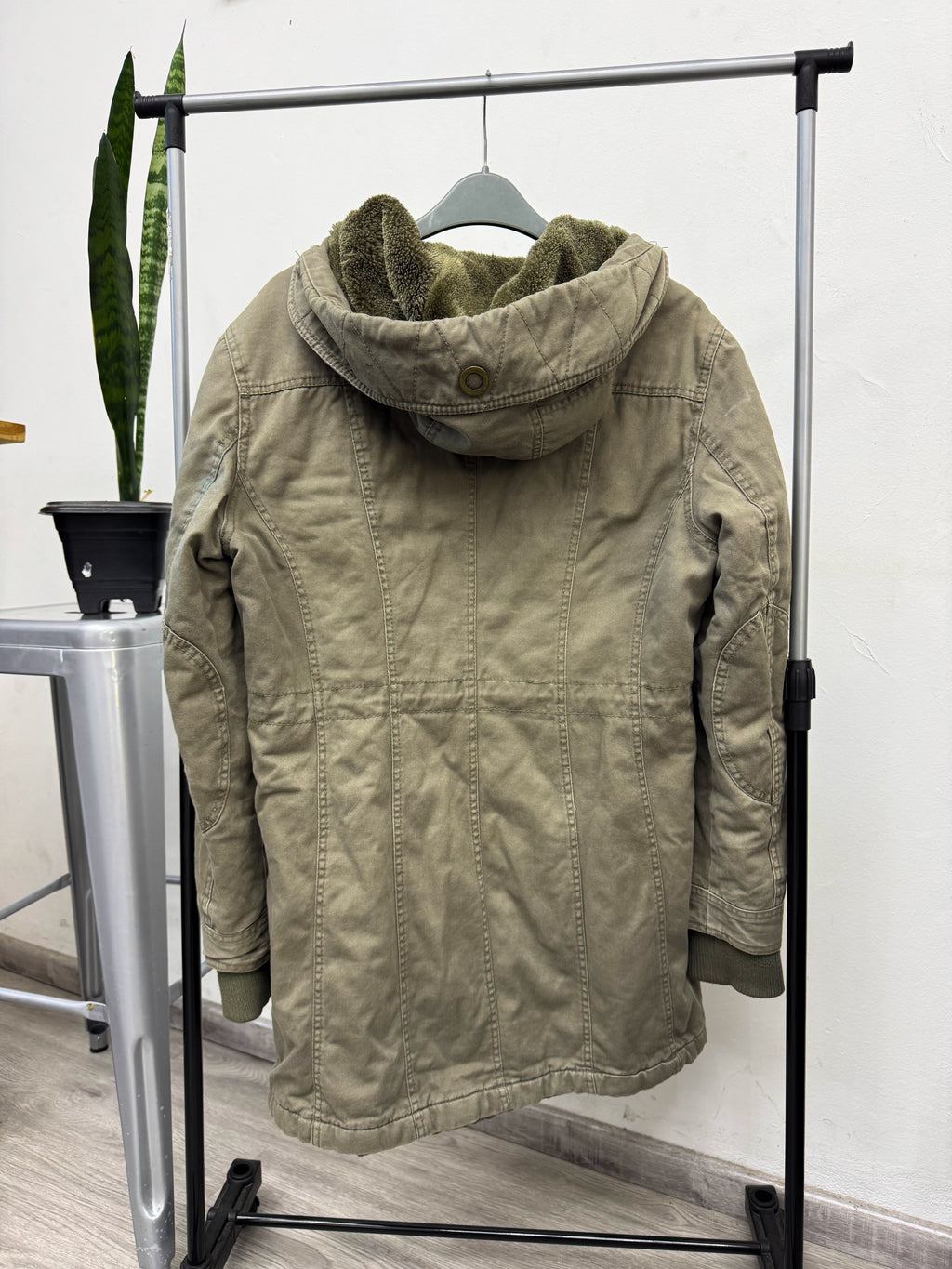 Parka verde abrigada