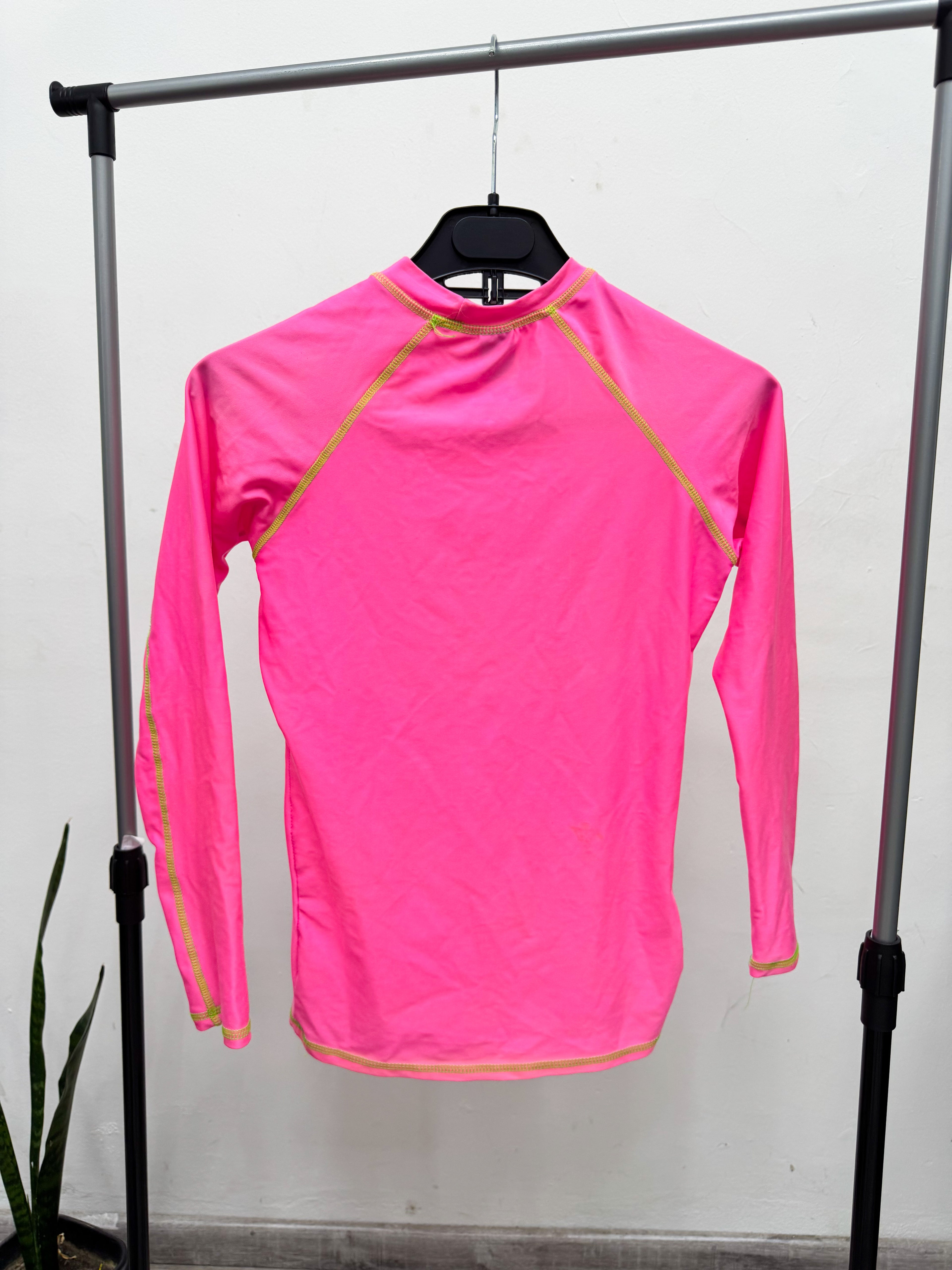 Remera rosada con protección UV